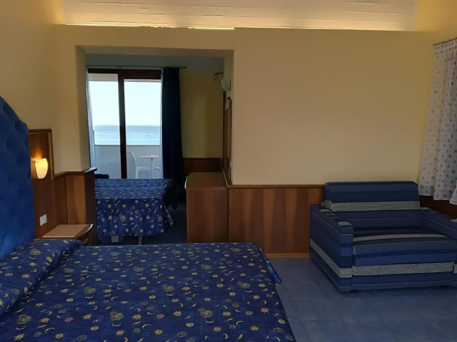 Bed in Kalos Hotel Bed in Kalos Hotel