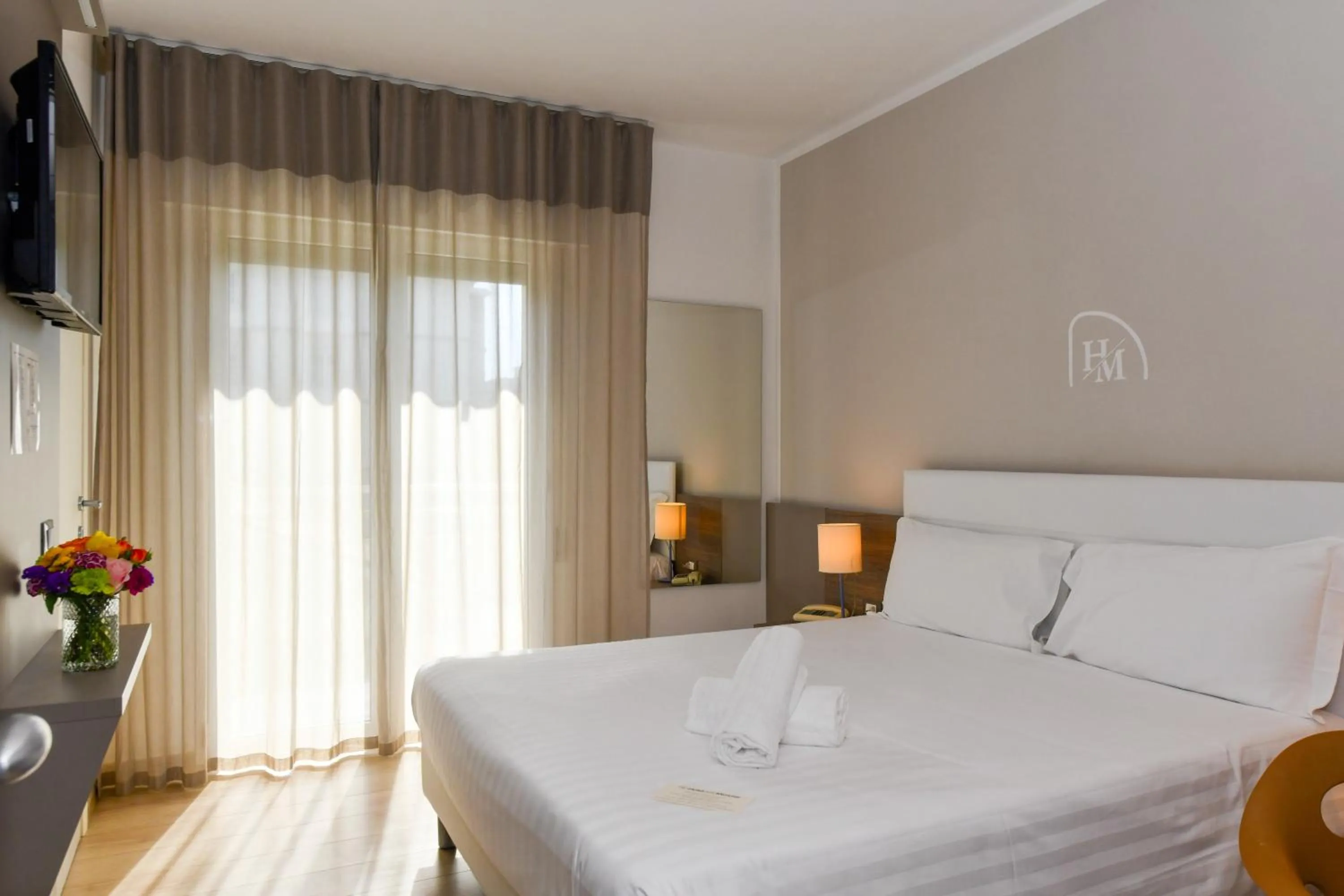 Bed in Hotel Delle Mimose