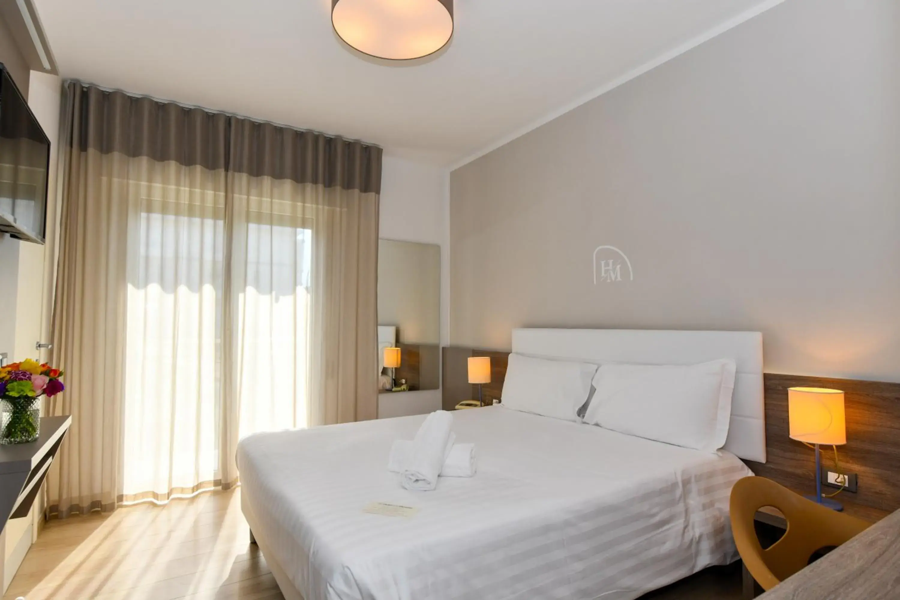 Standard Double or Twin Room with Lateral Sea View in Hotel Delle Mimose Standard Double or Twin Room with Lateral Sea View in Hotel Delle Mimose