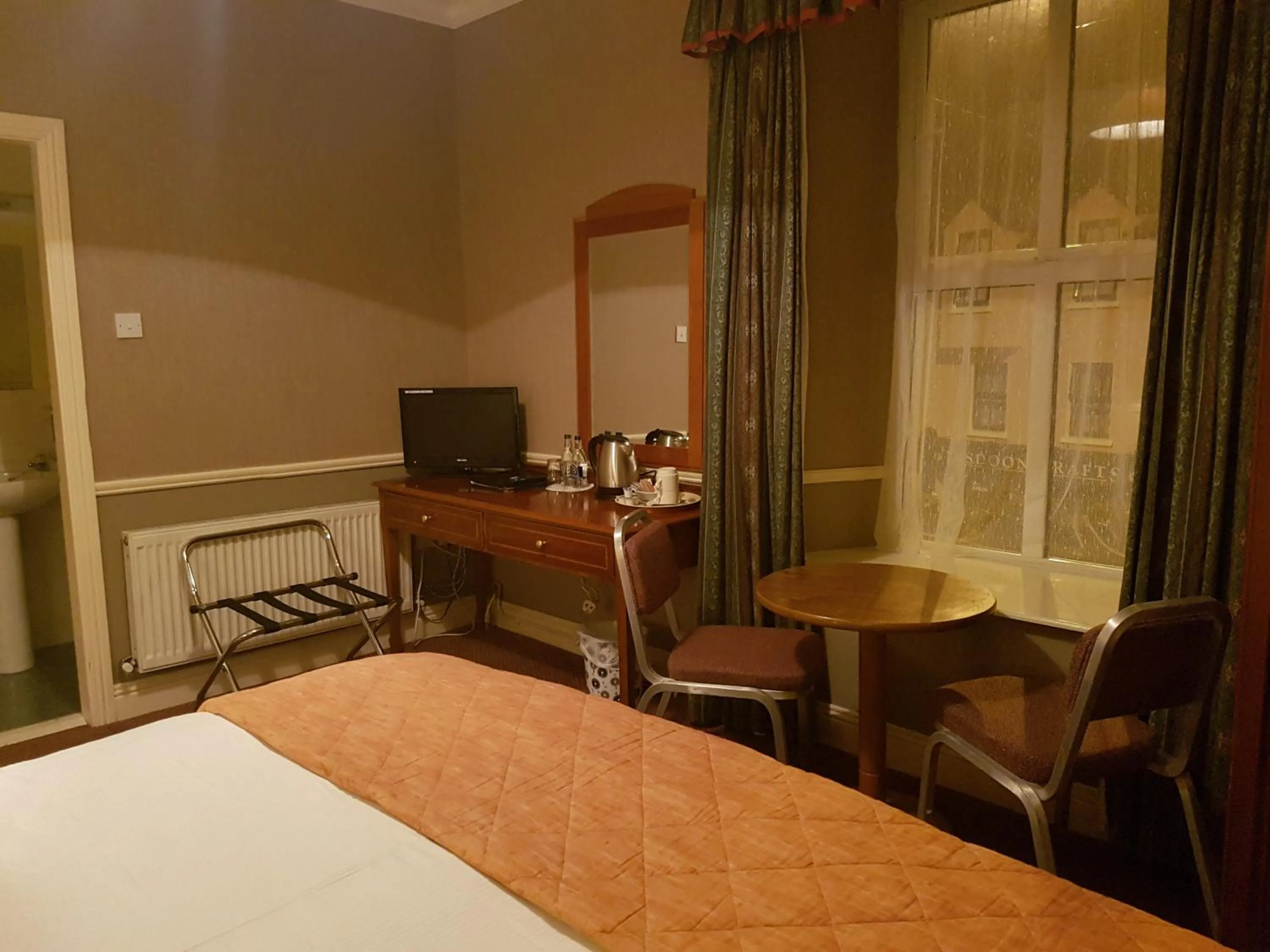 Bed in Royal Spa Hotel