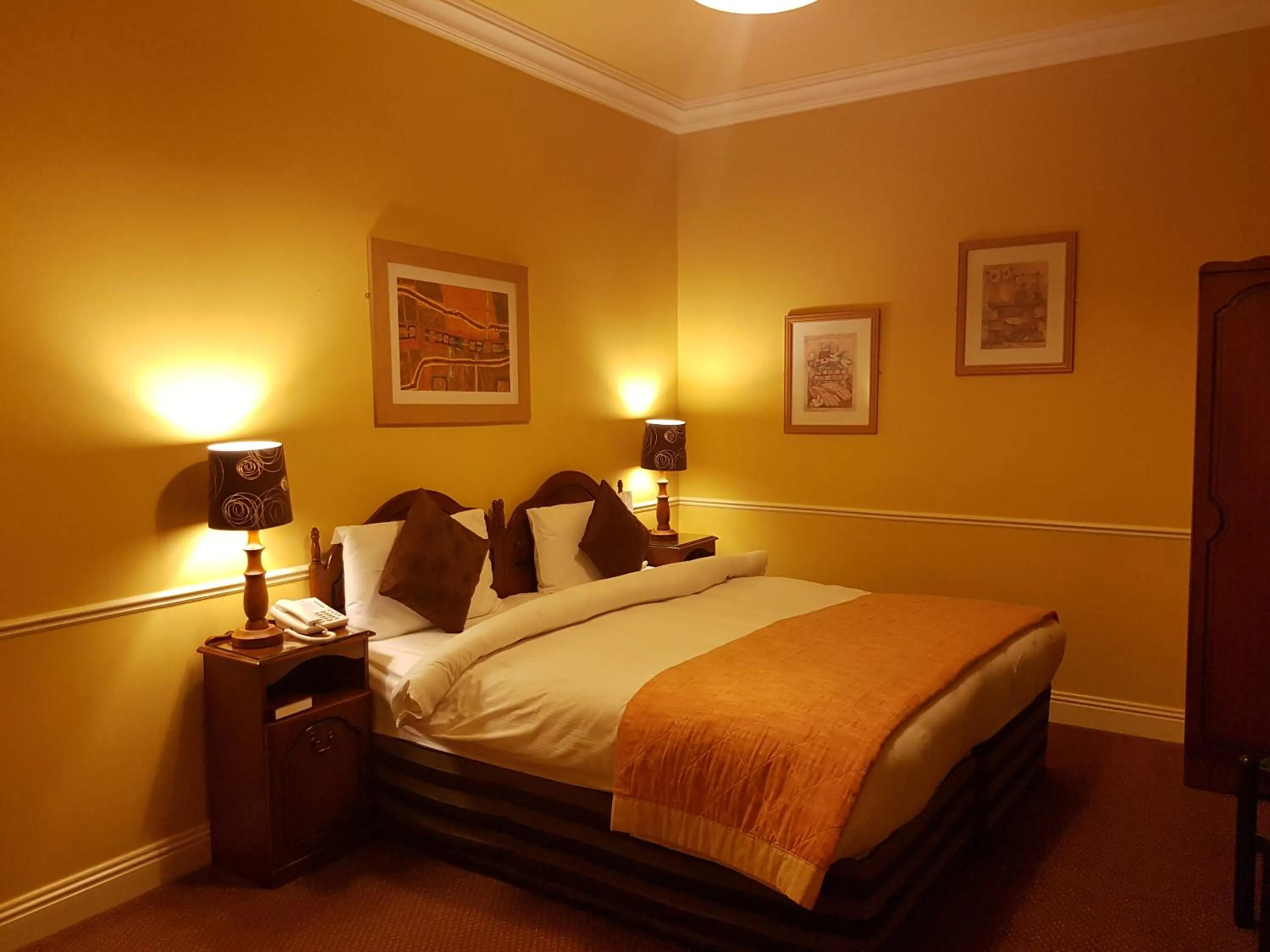 Bed in Royal Spa Hotel
