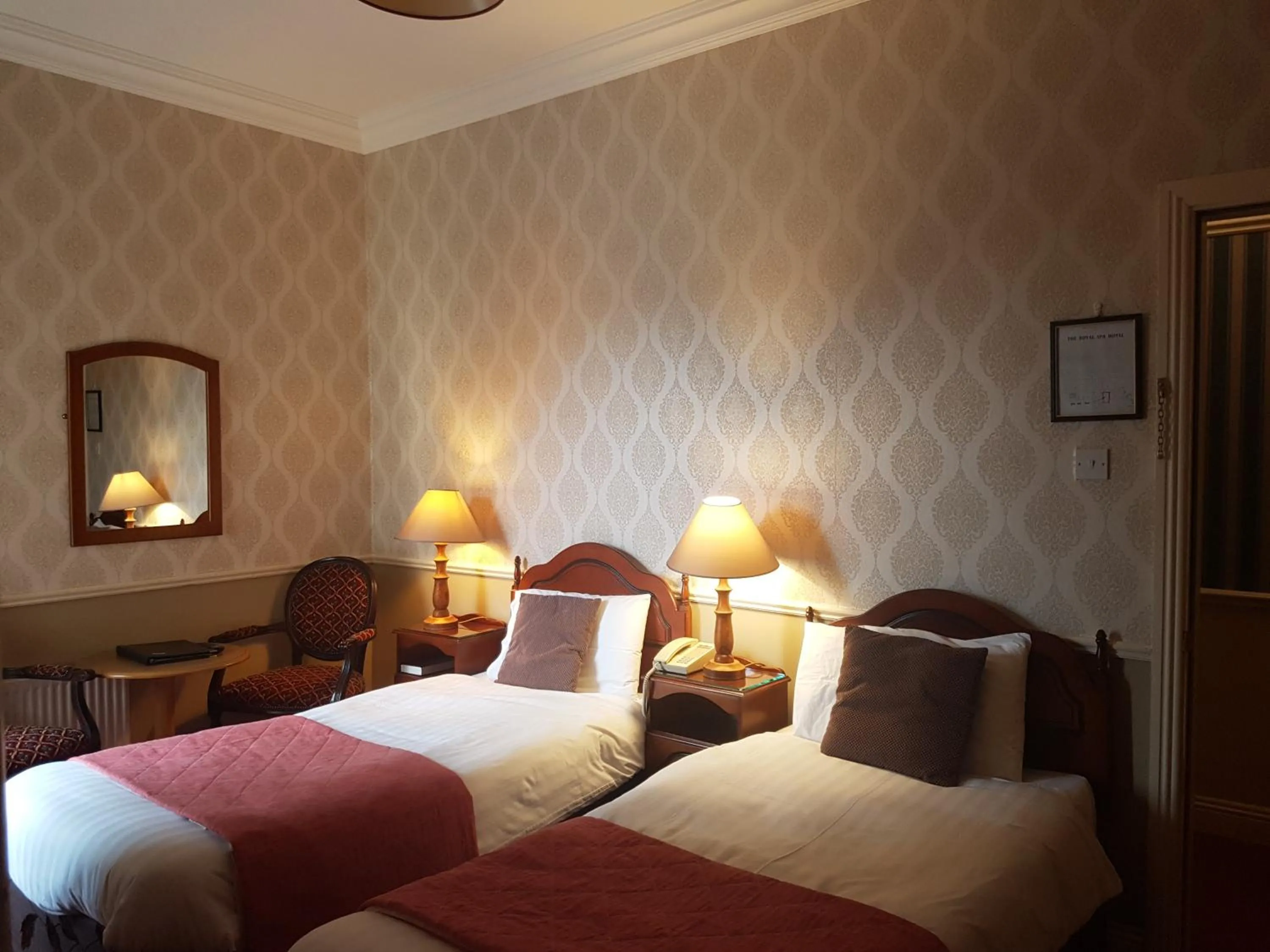 Bed in Royal Spa Hotel