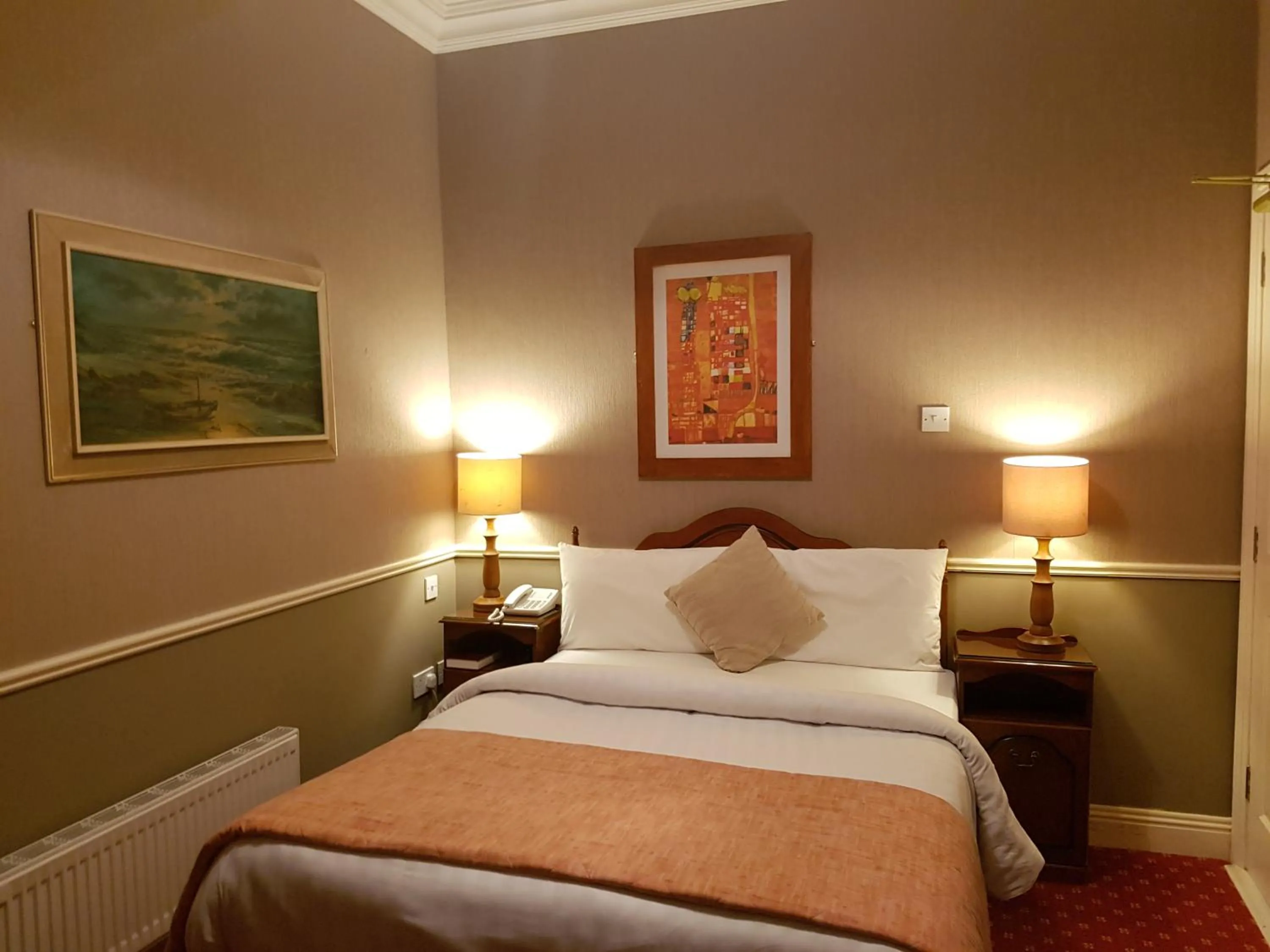 Bed in Royal Spa Hotel