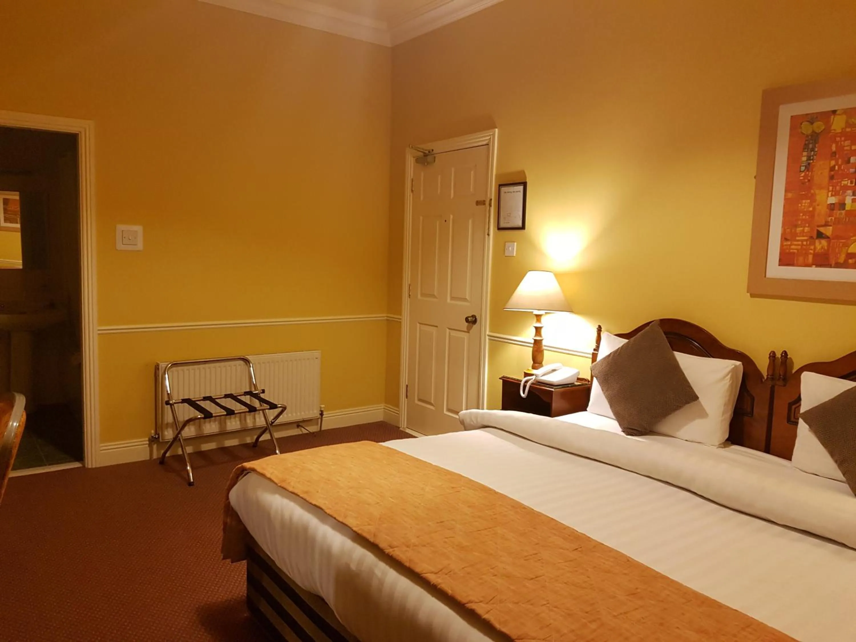 Bed in Royal Spa Hotel