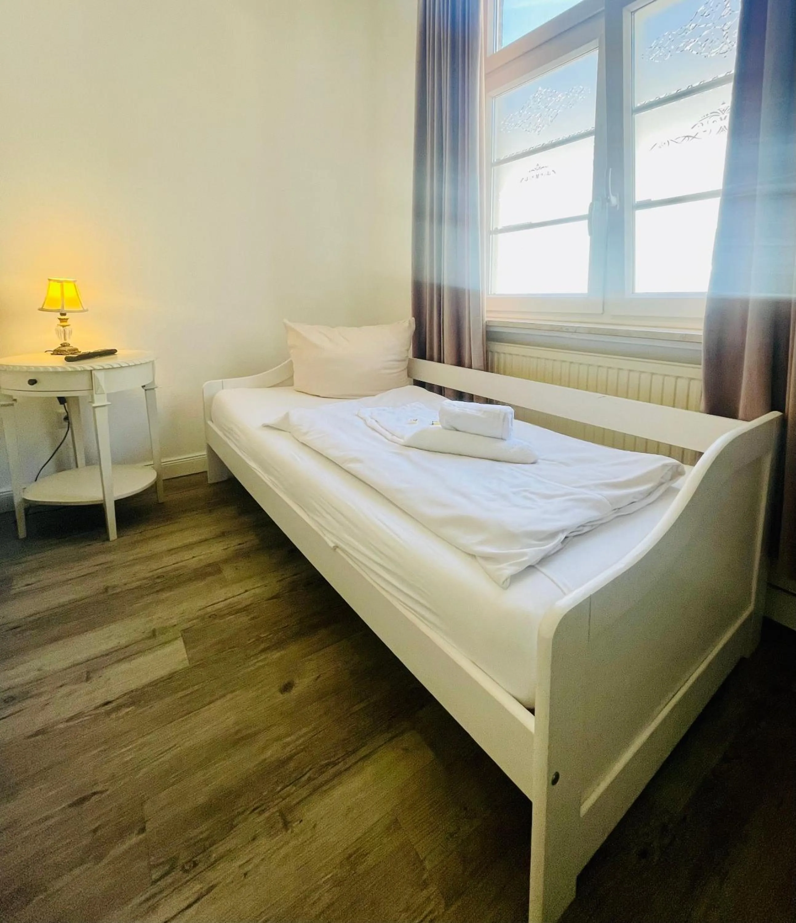 Bed in Stadthotel-Garni Smutje