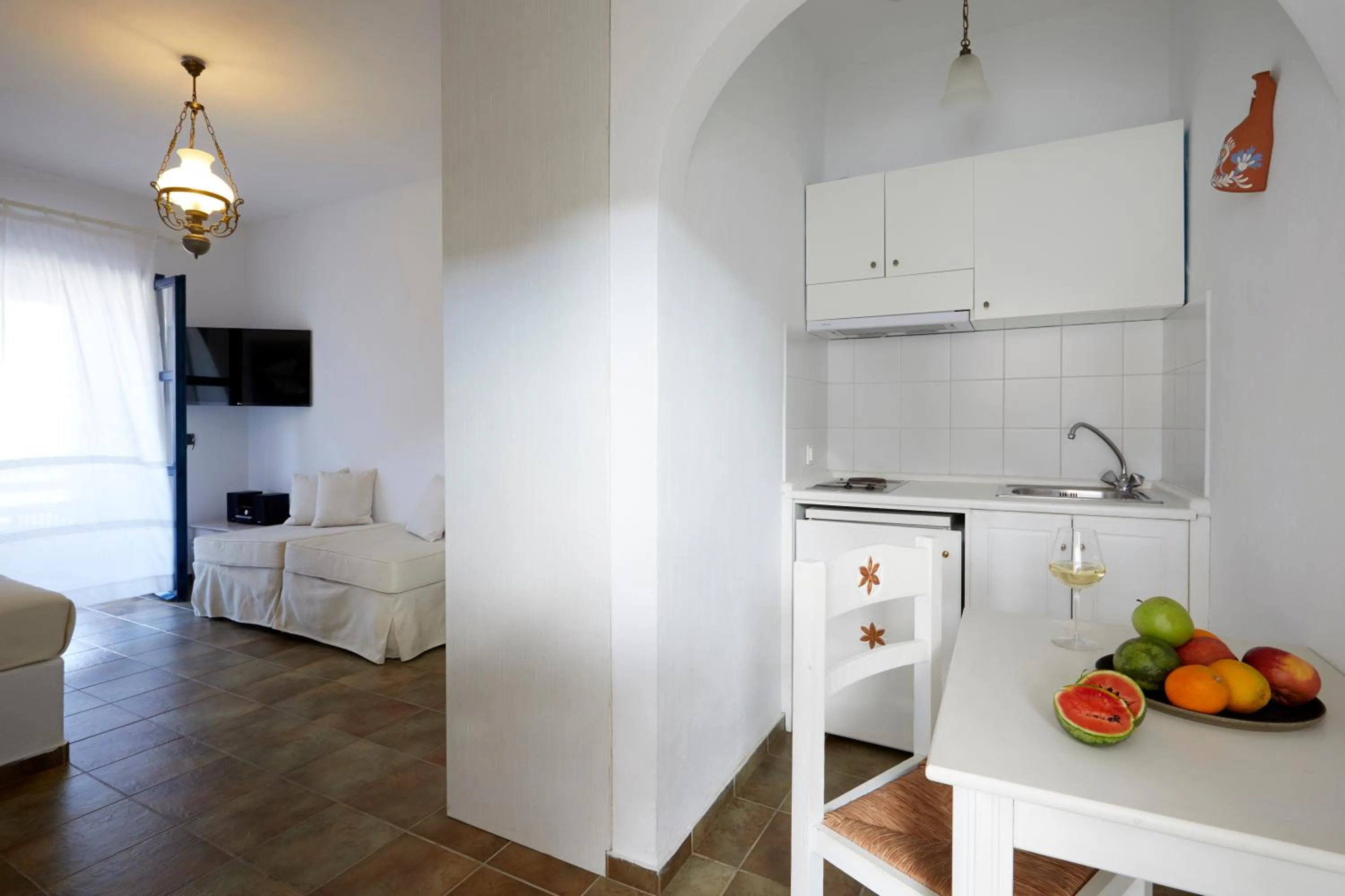Kitchen or kitchenette in Vrahos Boutique Hotel