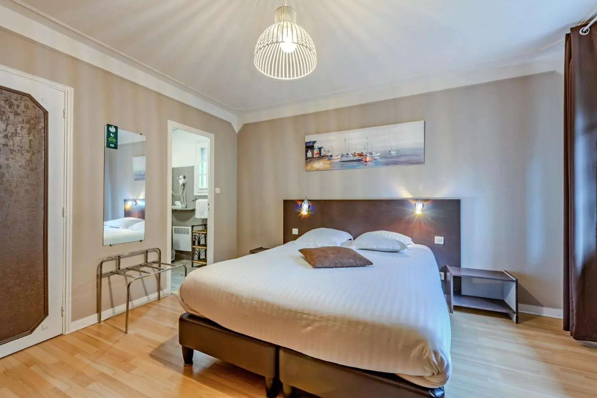 Bed in Logis Hotel De La Corniche Bed in Logis Hotel De La Corniche