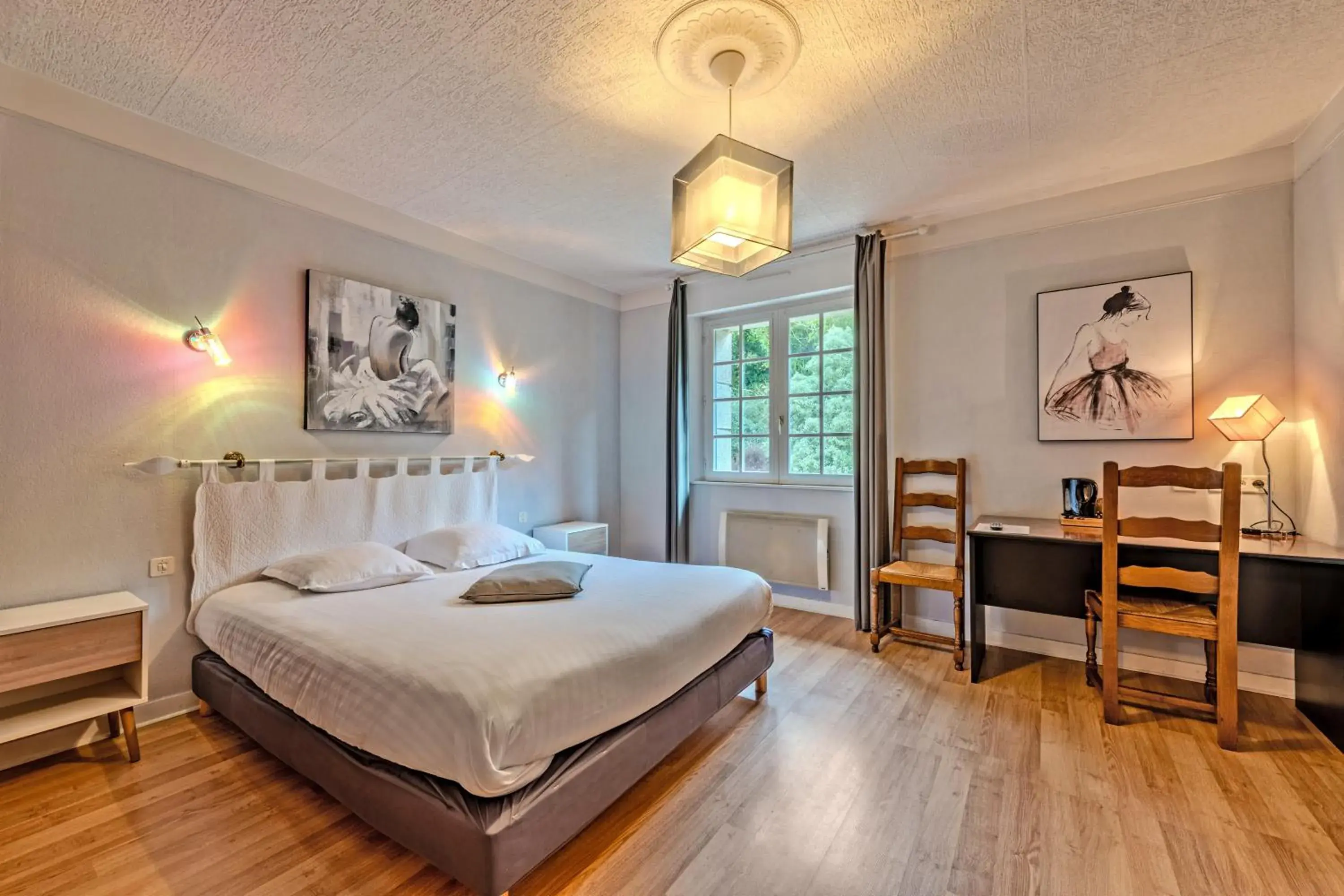 Bed in Logis Hotel De La Corniche Bed in Logis Hotel De La Corniche