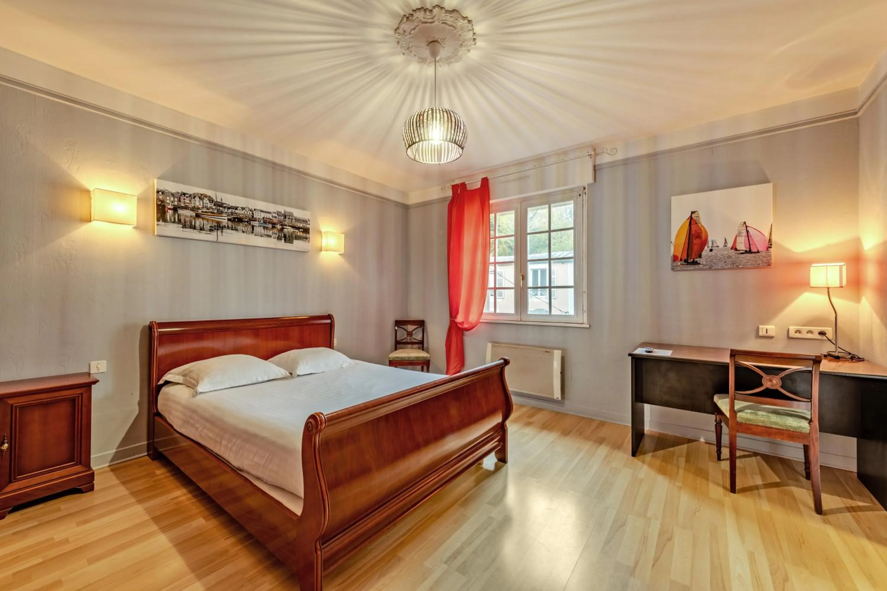 Bed in Logis Hotel De La Corniche