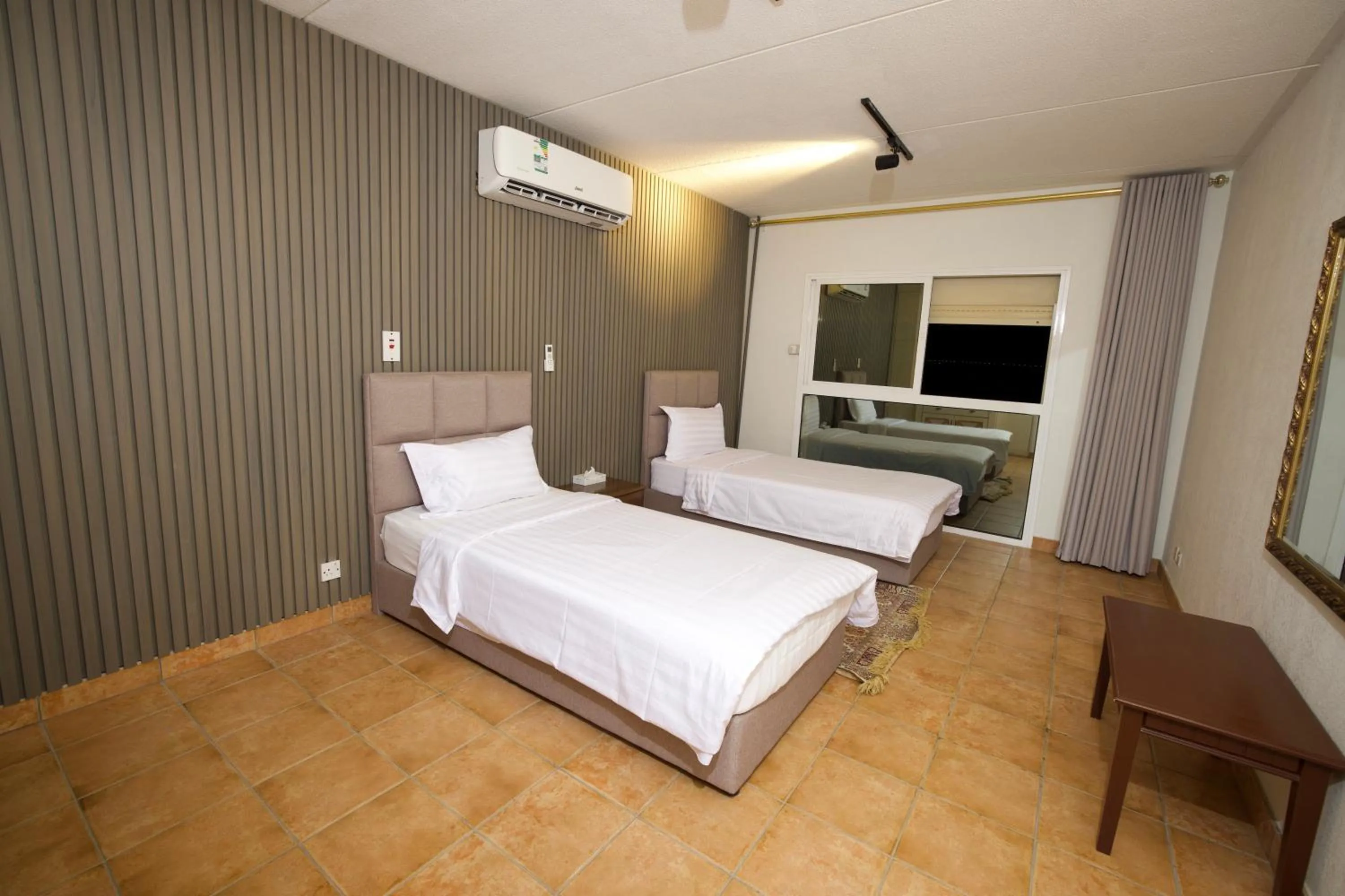 Bed in Palm Beach Resort Half Moon