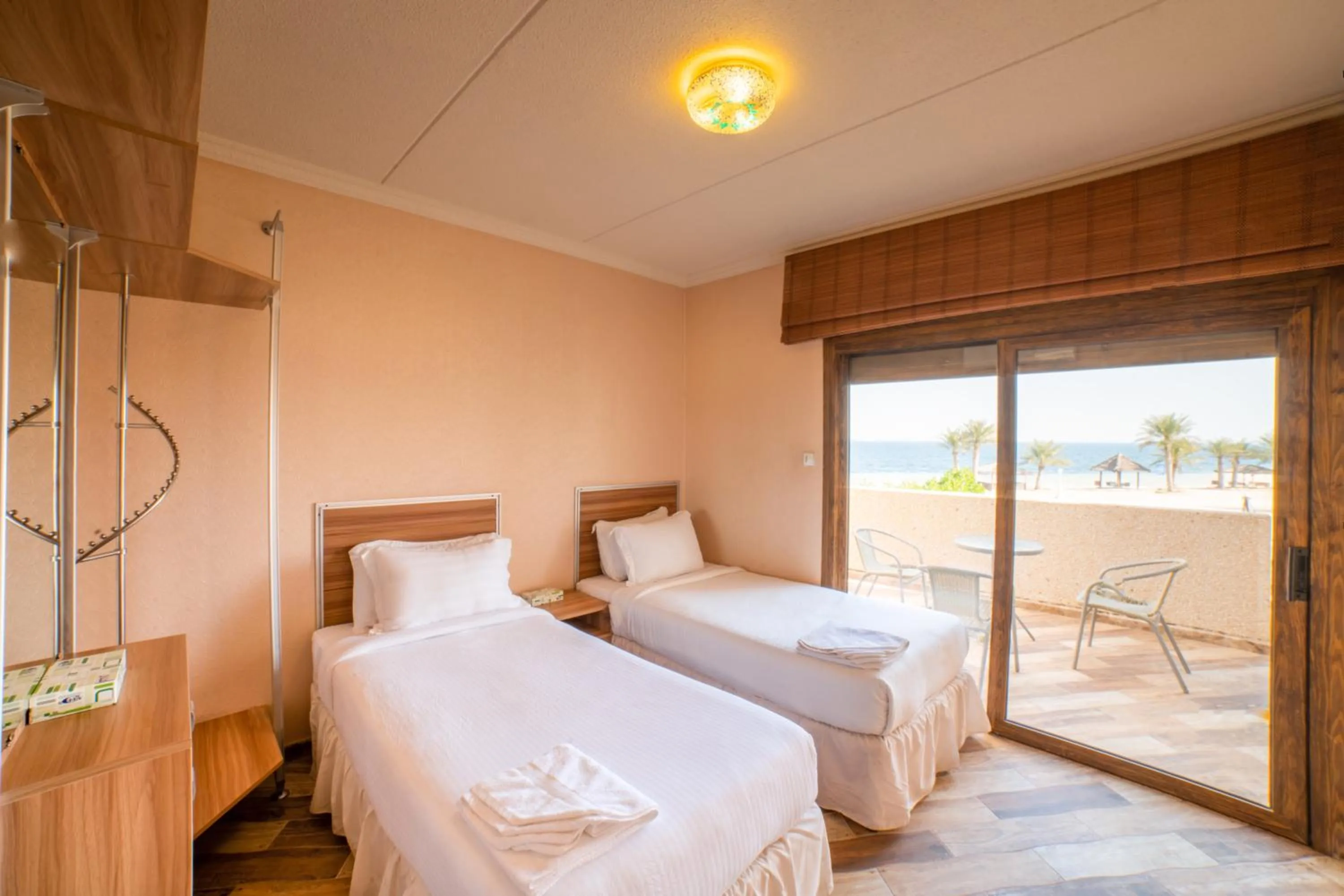 Bed in Palm Beach Resort Half Moon