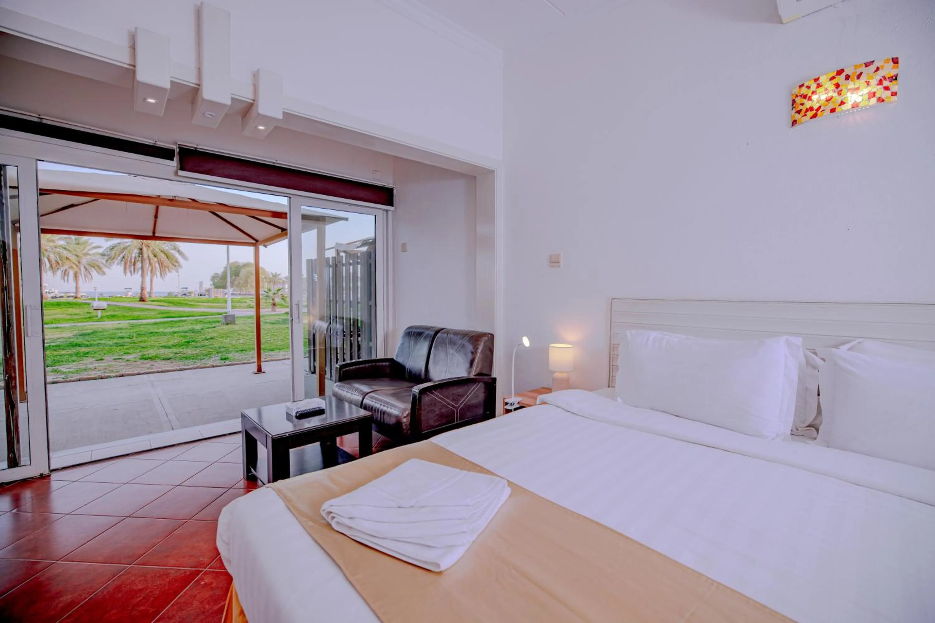 Bed in Palm Beach Resort Half Moon
