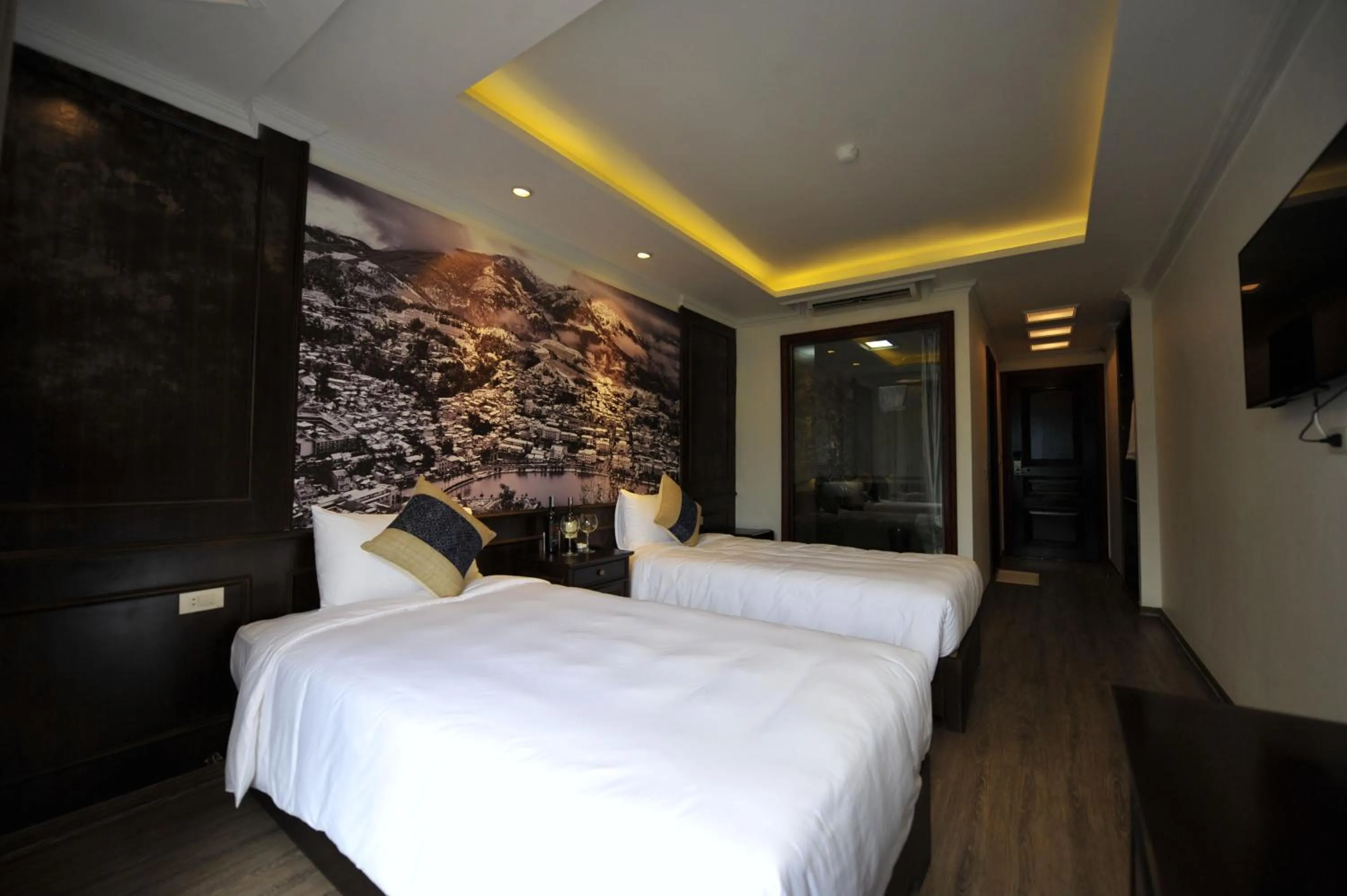 Photo of the whole room, Bed in Delta Sapa Hotel - Old Quarter Center