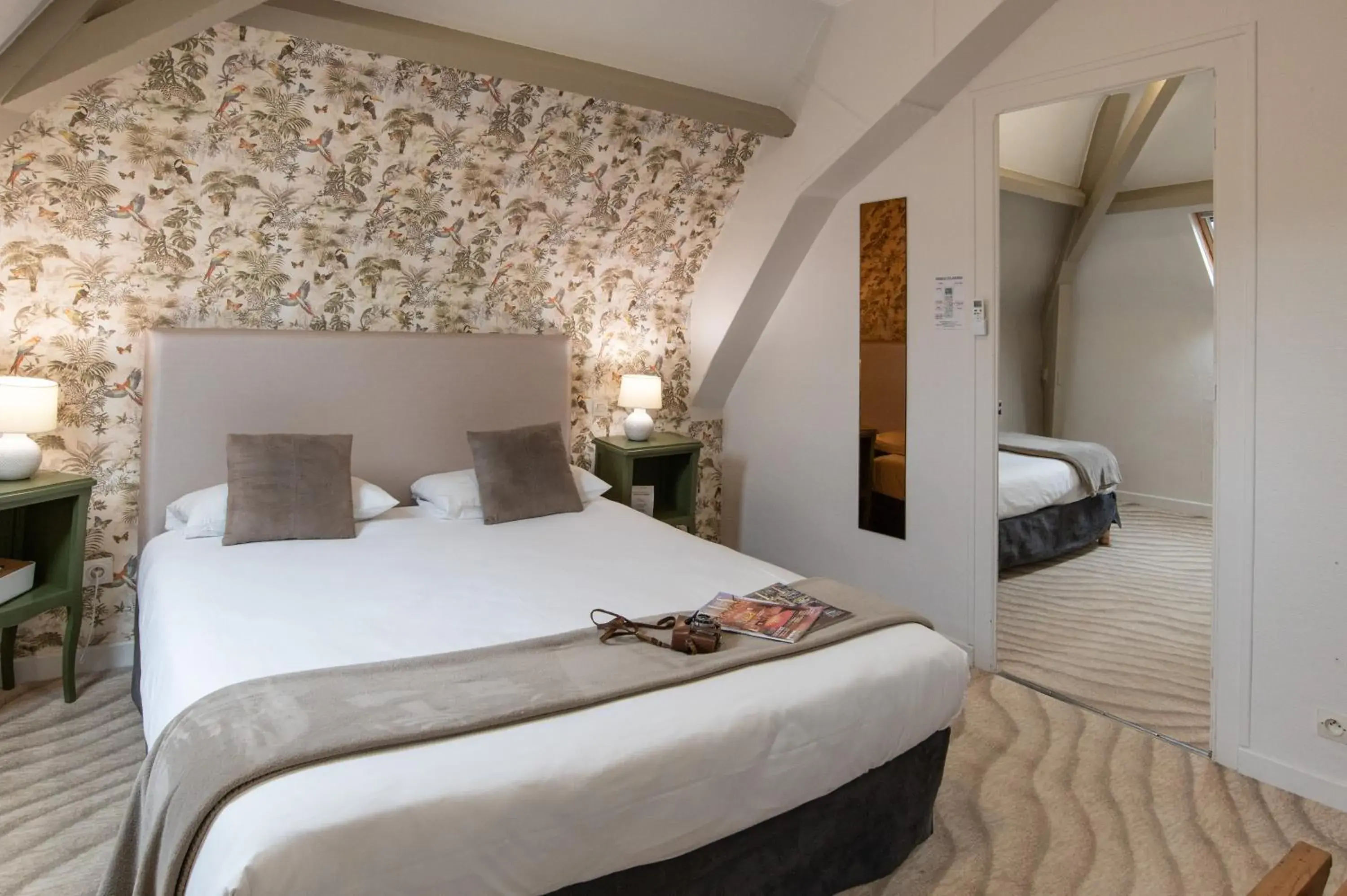 Bed in The Originals Boutique, Hôtel Victoria, Châtelaillon-Plage Bed in The Originals Boutique, Hôtel Victoria, Châtelaillon-Plage