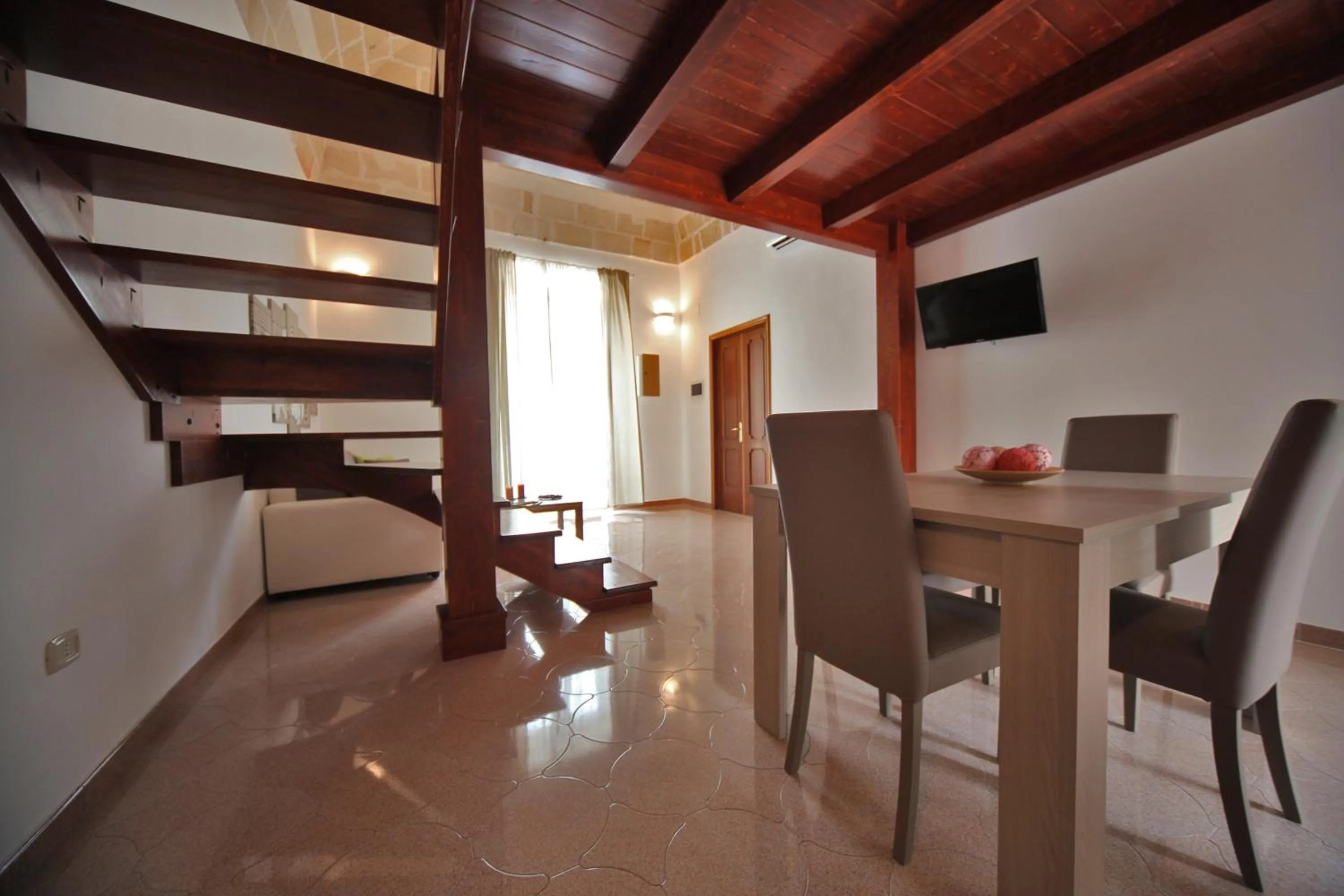 Seating area in La Buona Creanza by Jdvacanze