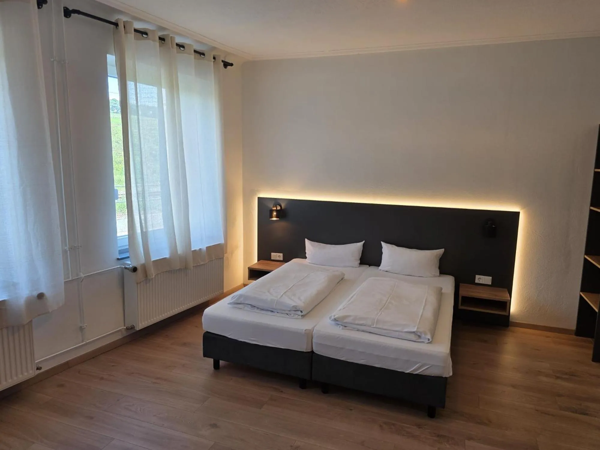 Photo of the whole room, Bed in Wein Erlebnis Hotel Maimühle