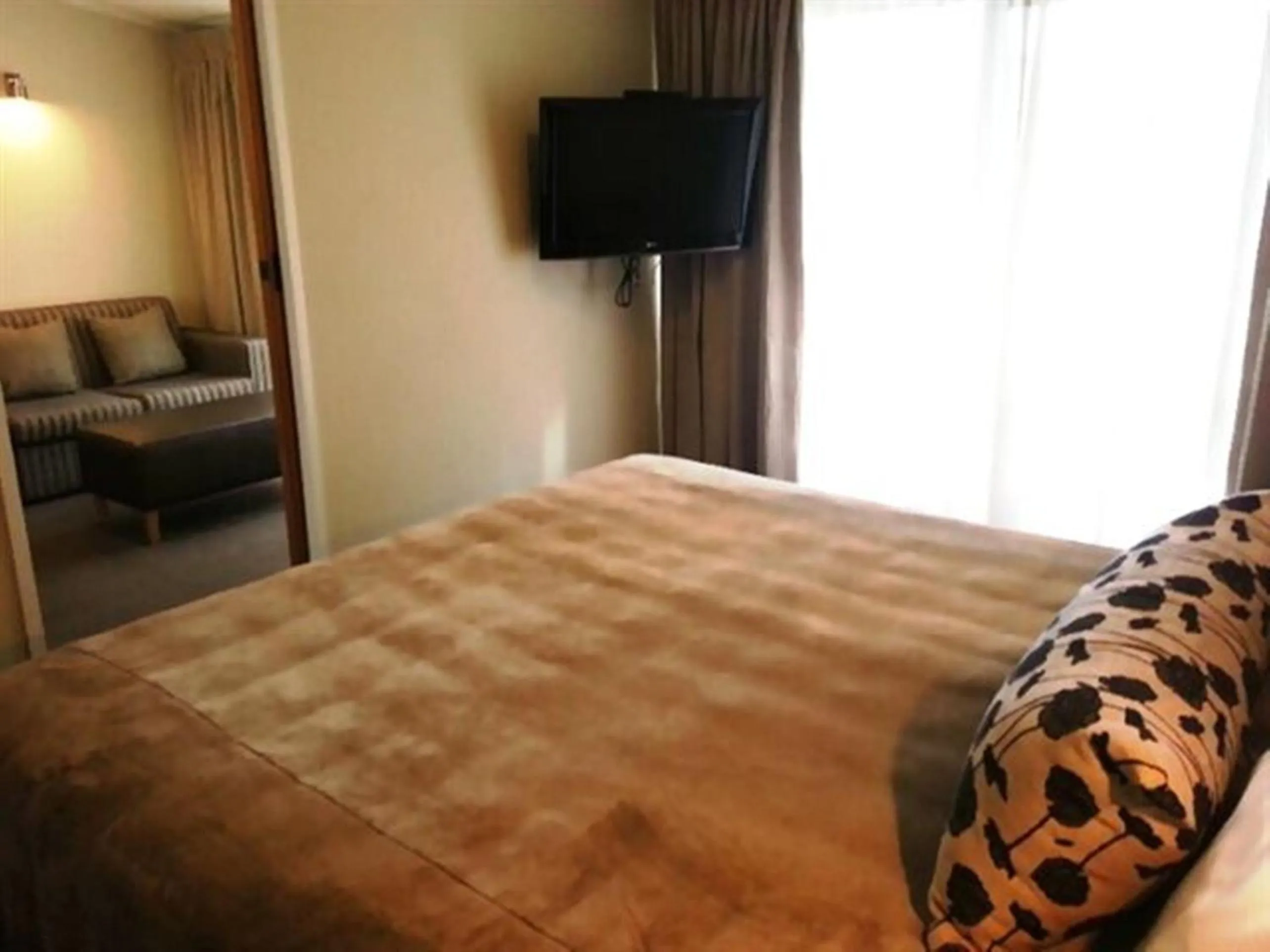 Bedroom, Bed in Marineland Beachfront Accommodation