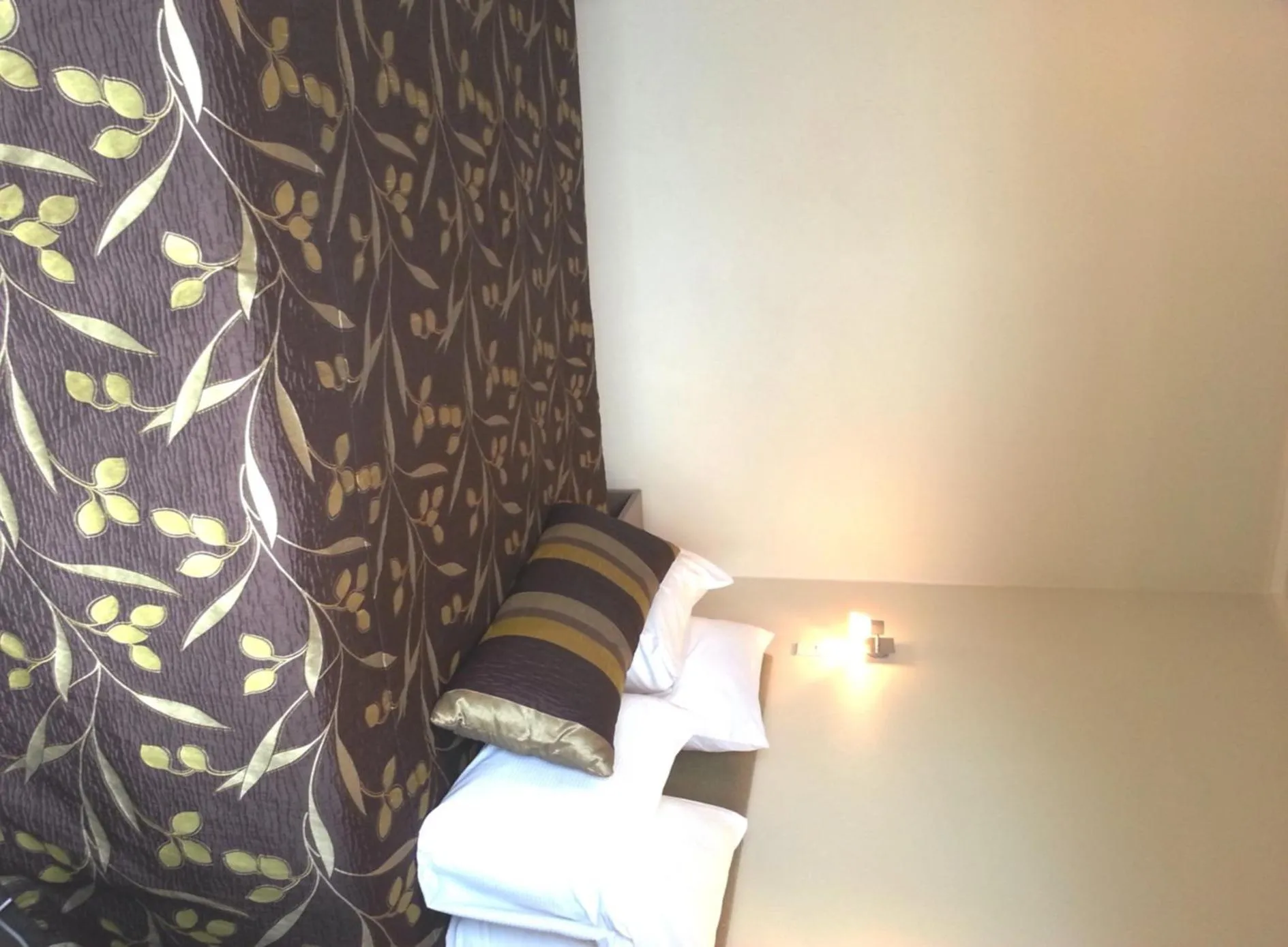 Bed in Marineland Beachfront Accommodation