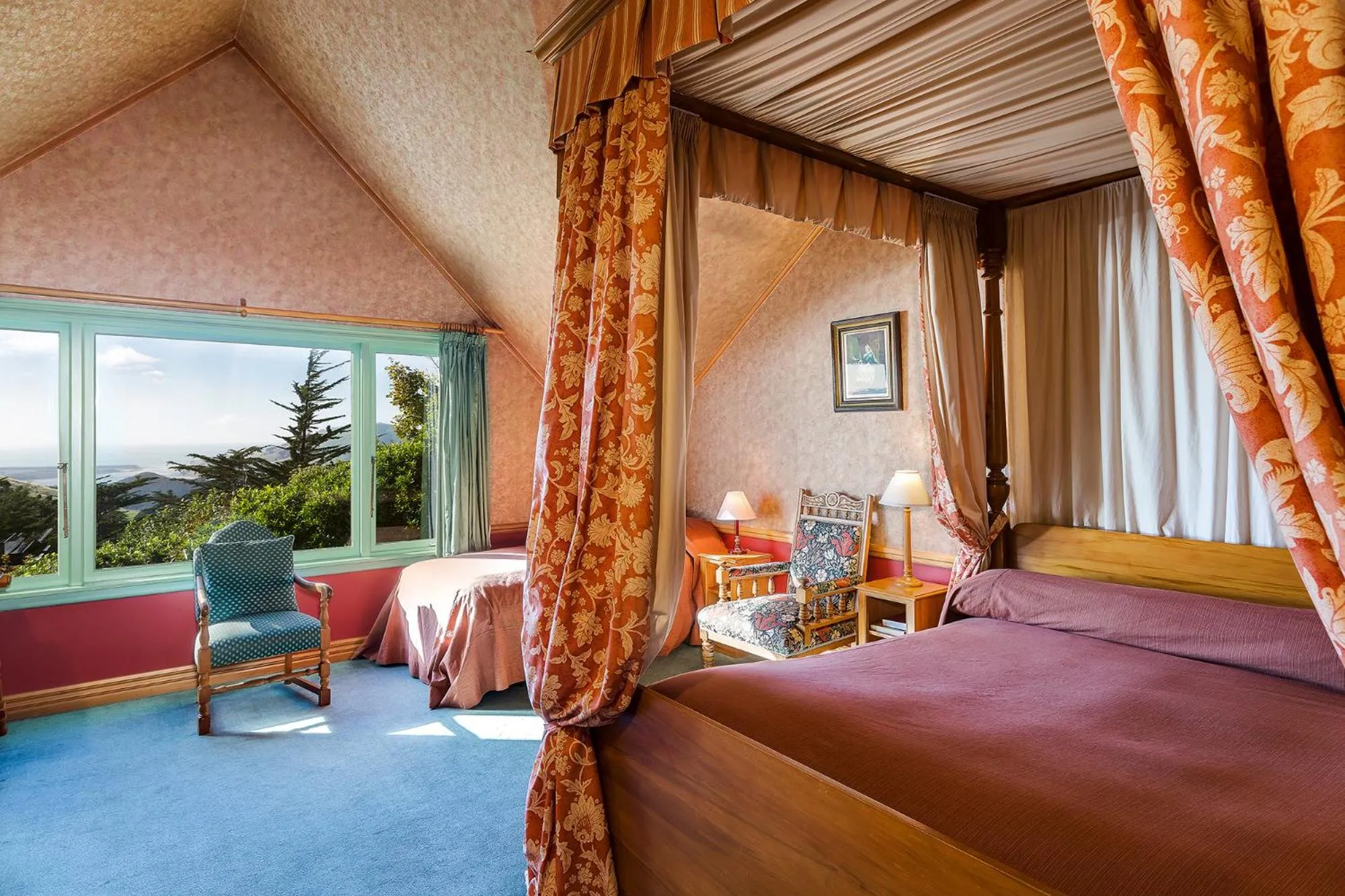 Bed in Larnach Lodge & Stable Stay