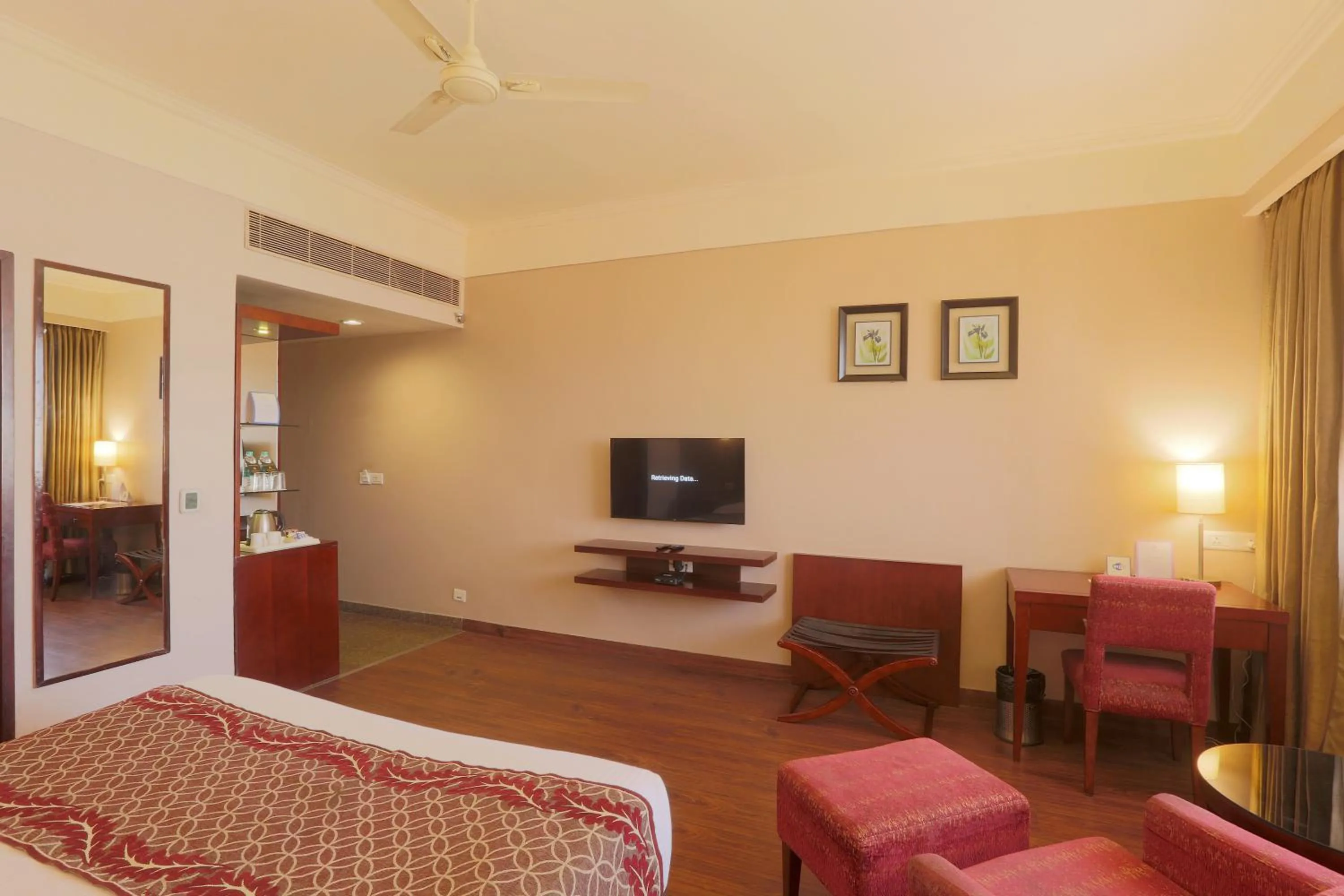 Communal lounge/ TV room, Bed in Vesta Maurya Palace