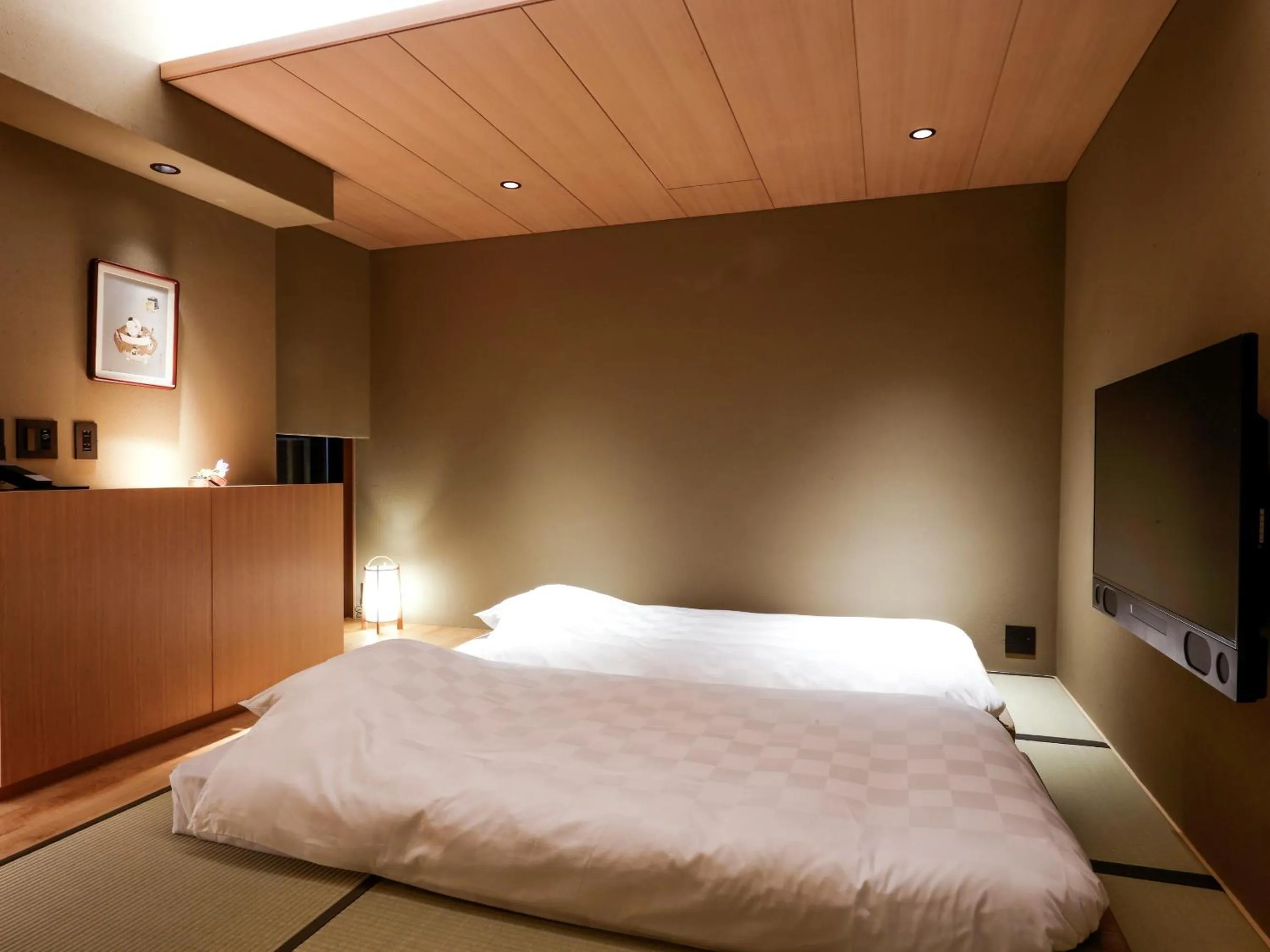 Bed in Kaminarimon Ryokan