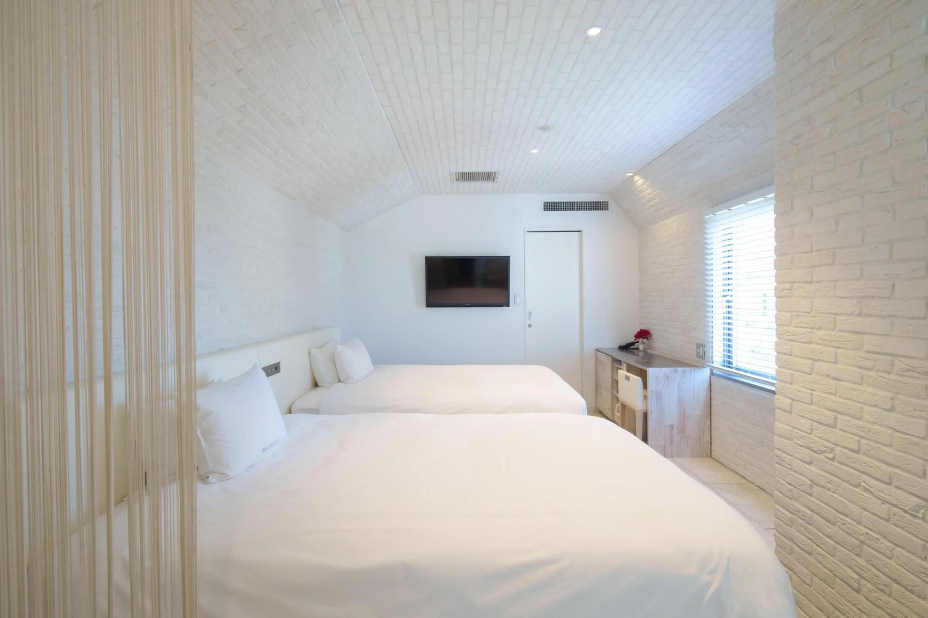 Bed in EN Hotel Shibuya