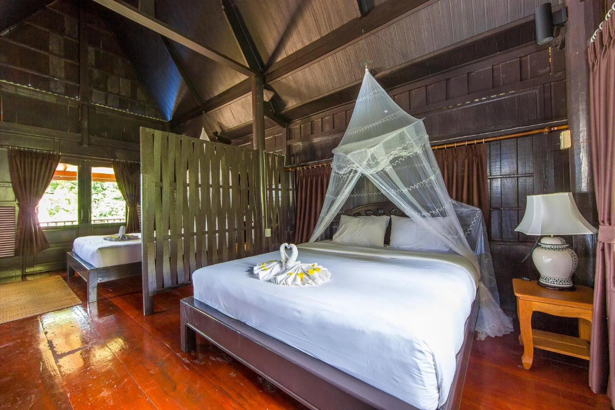 Bed in Koh Talu Island Resort