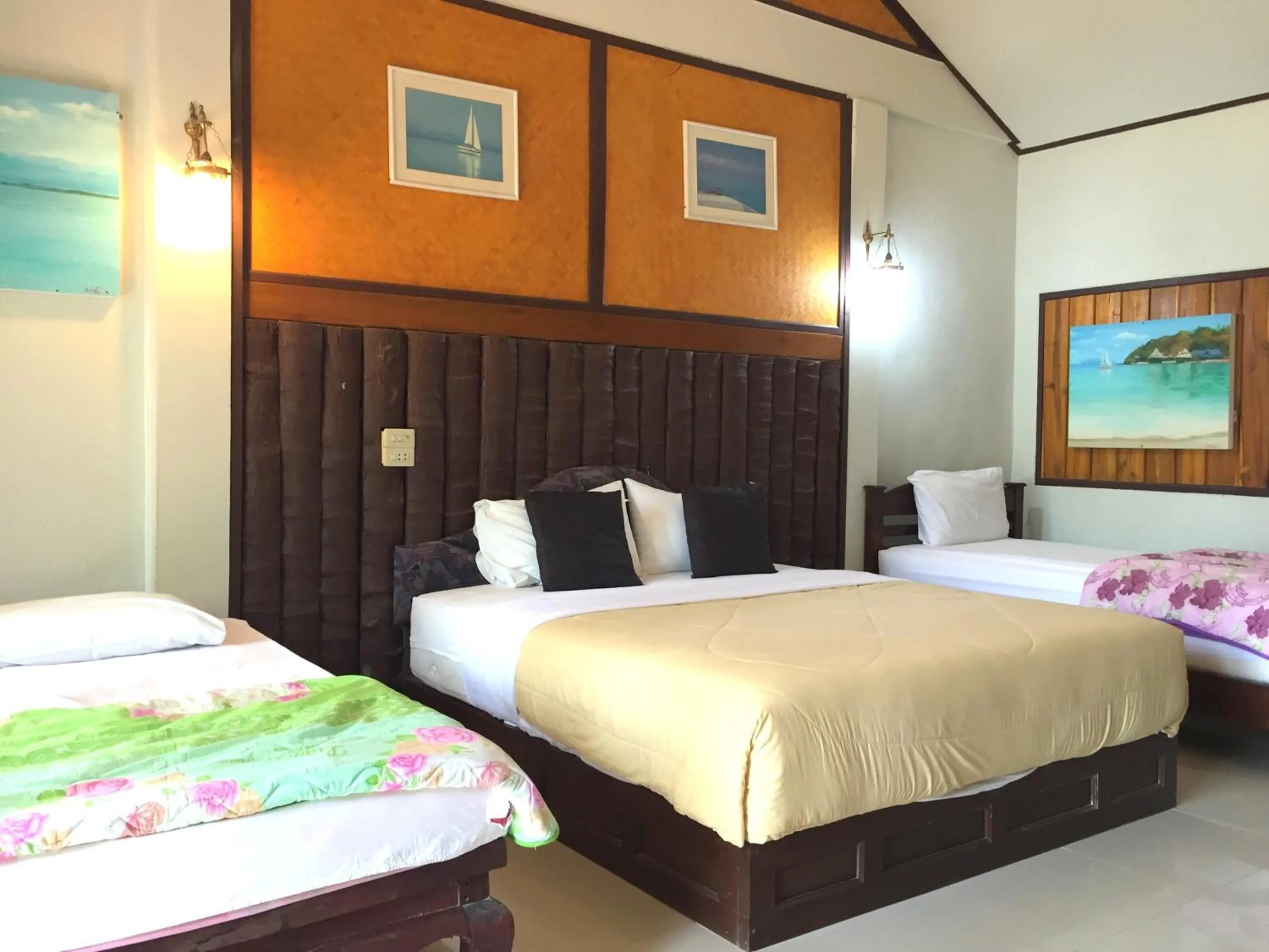 Bed in Koh Talu Island Resort