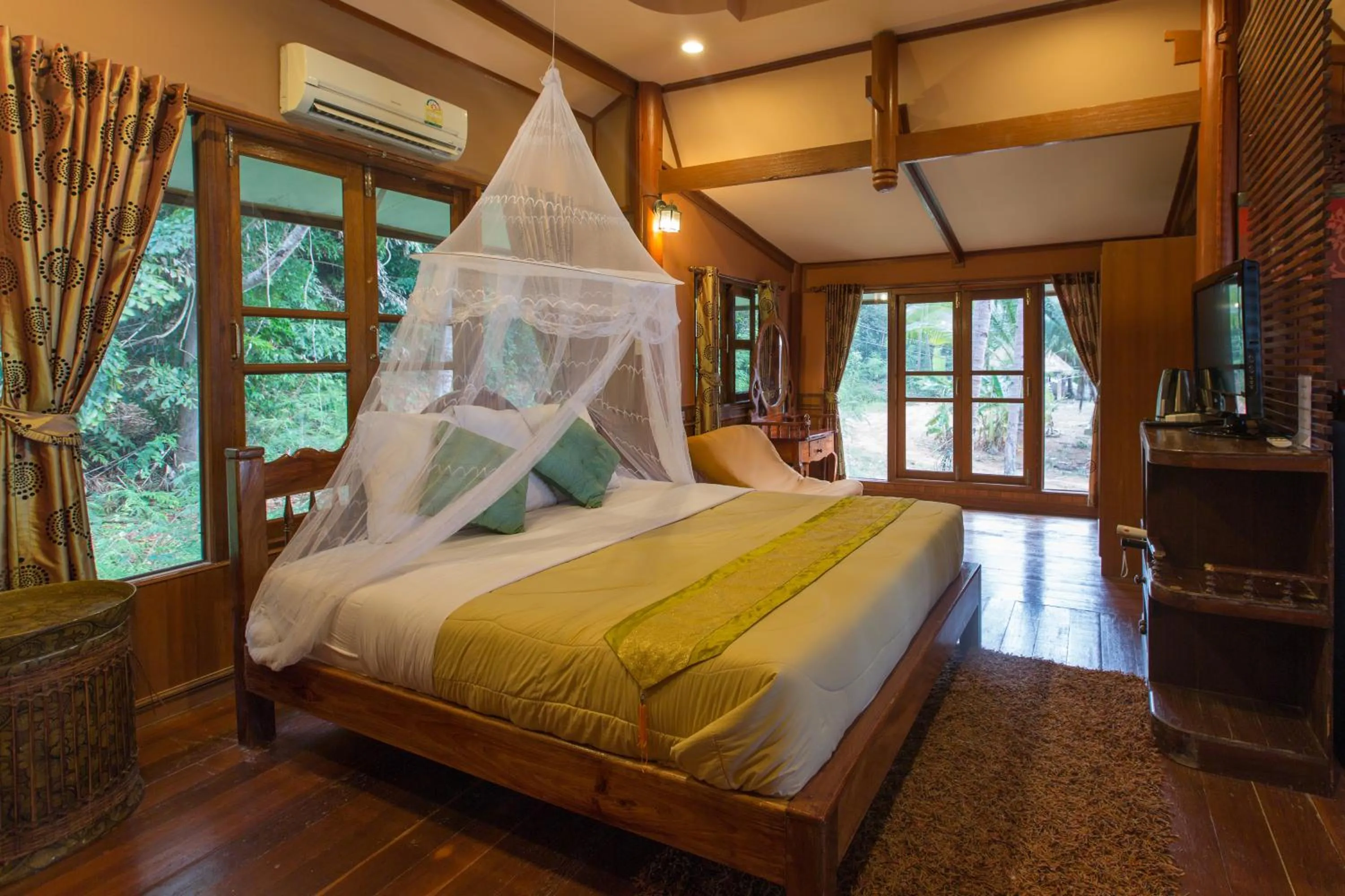 Bed in Koh Talu Island Resort