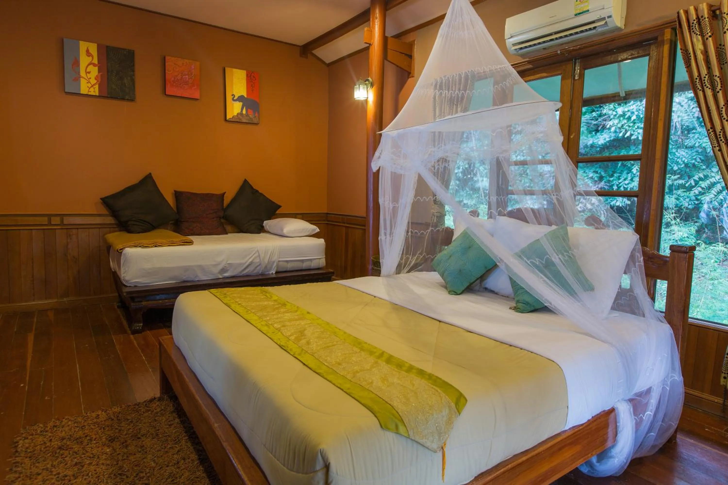 Bed in Koh Talu Island Resort