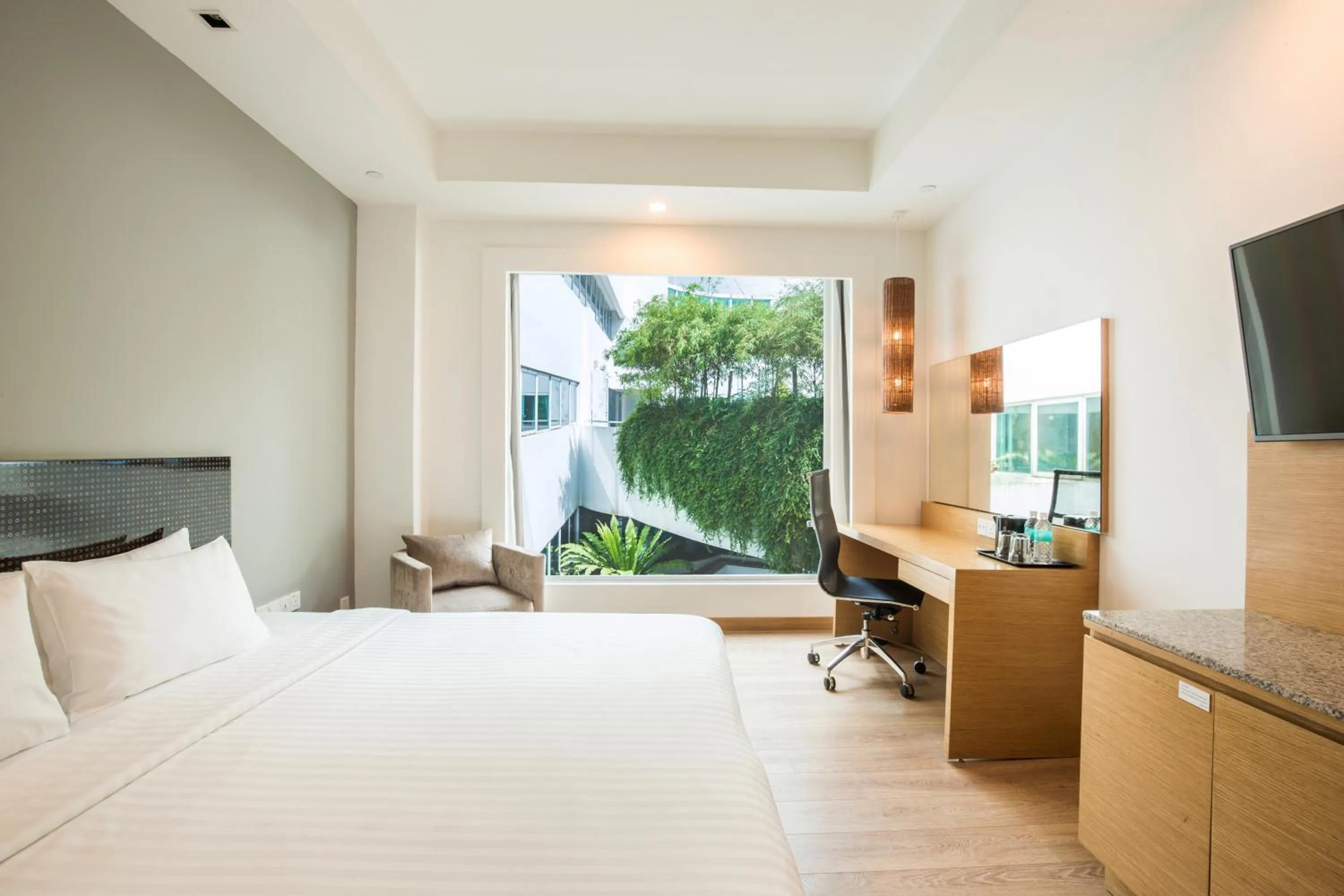 Photo of the whole room, Bed in Village Hotel Changi by Far East Hospitality