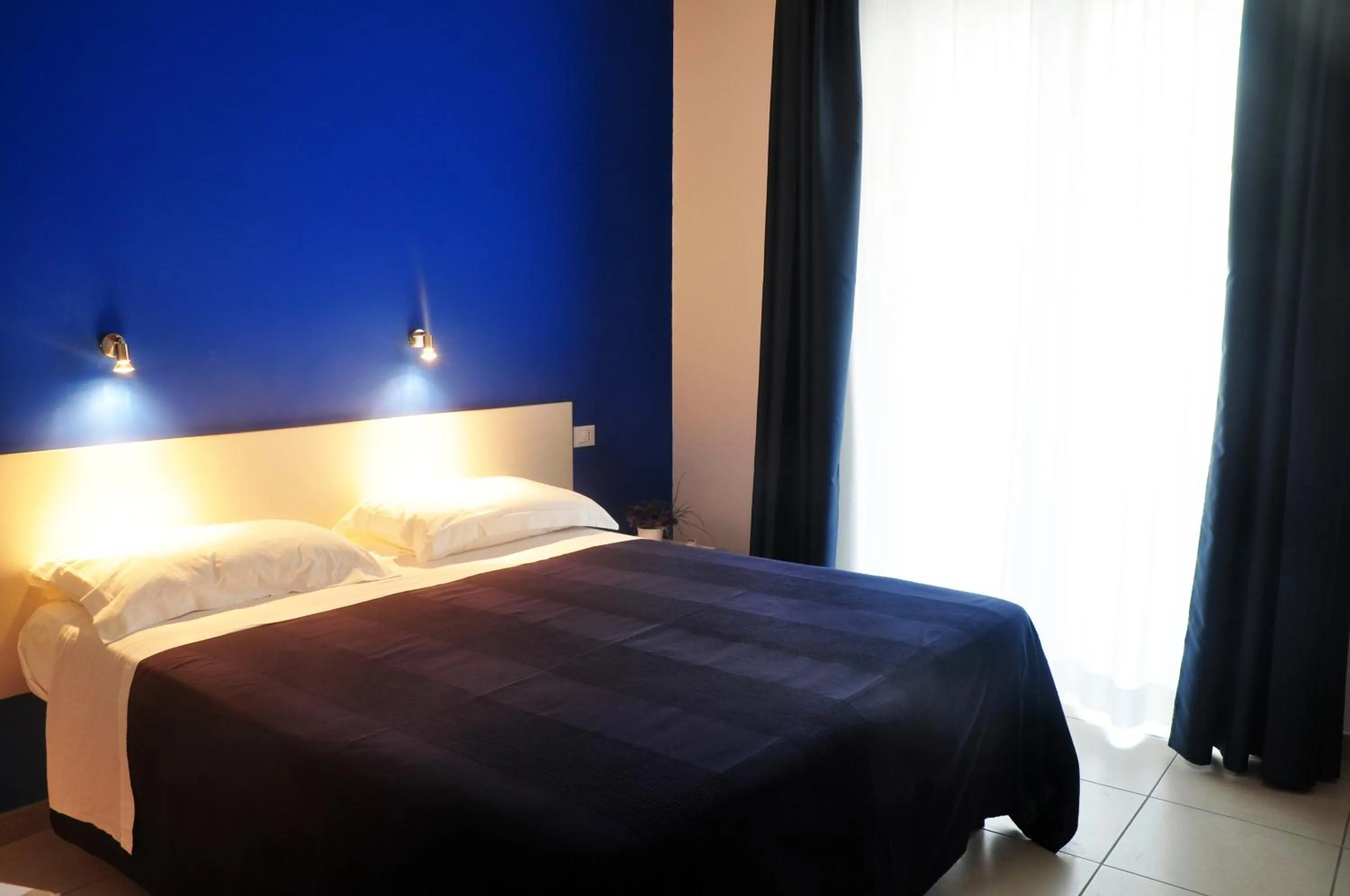 Day, Bed in Hotel La Punta