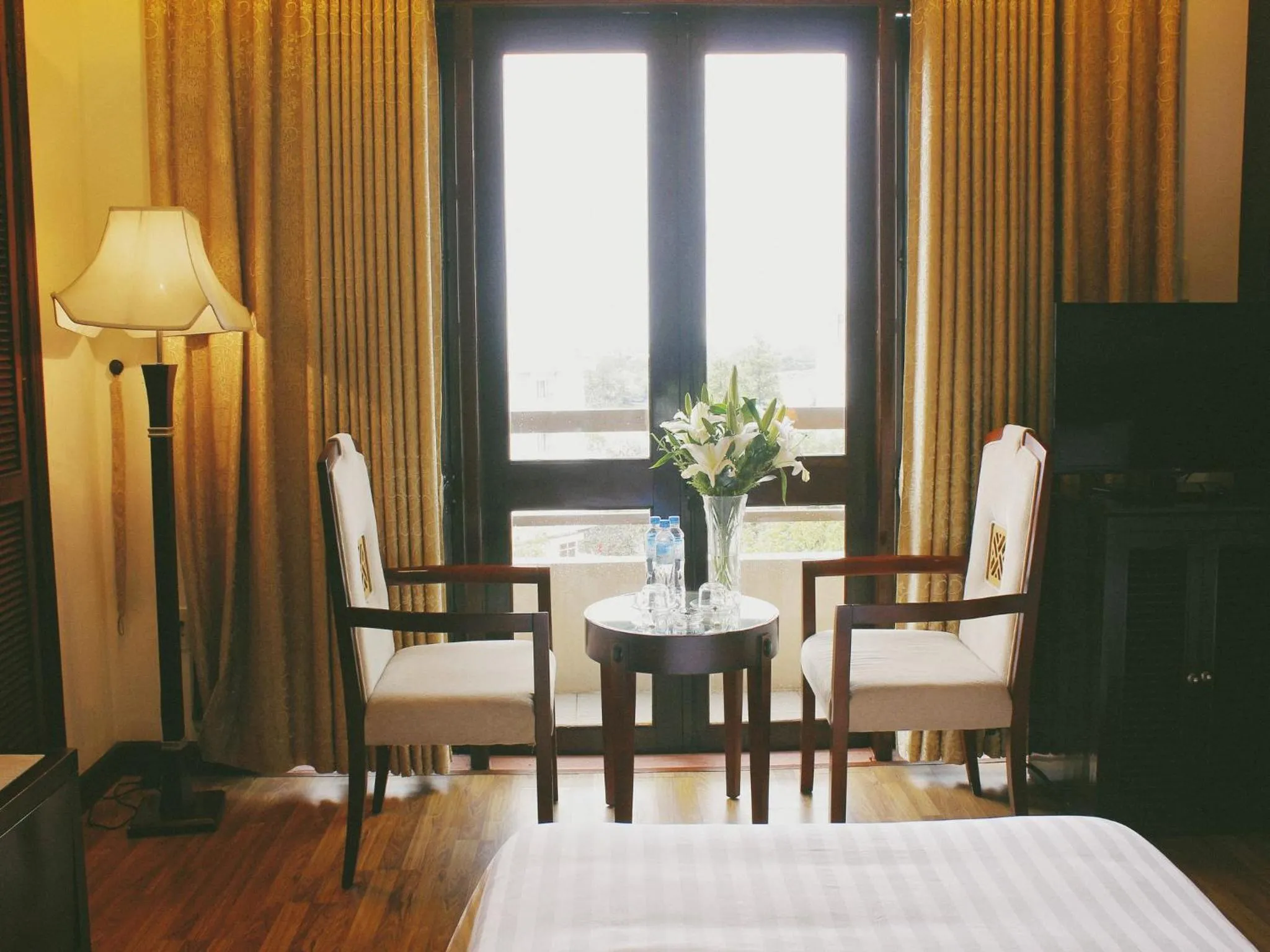 Seating area, Bed in Cosiana Hue Hotel