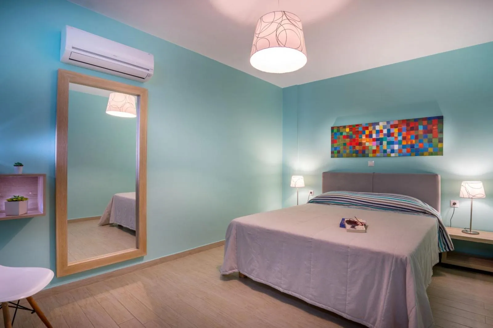 Bed in Stella in the Village Suites