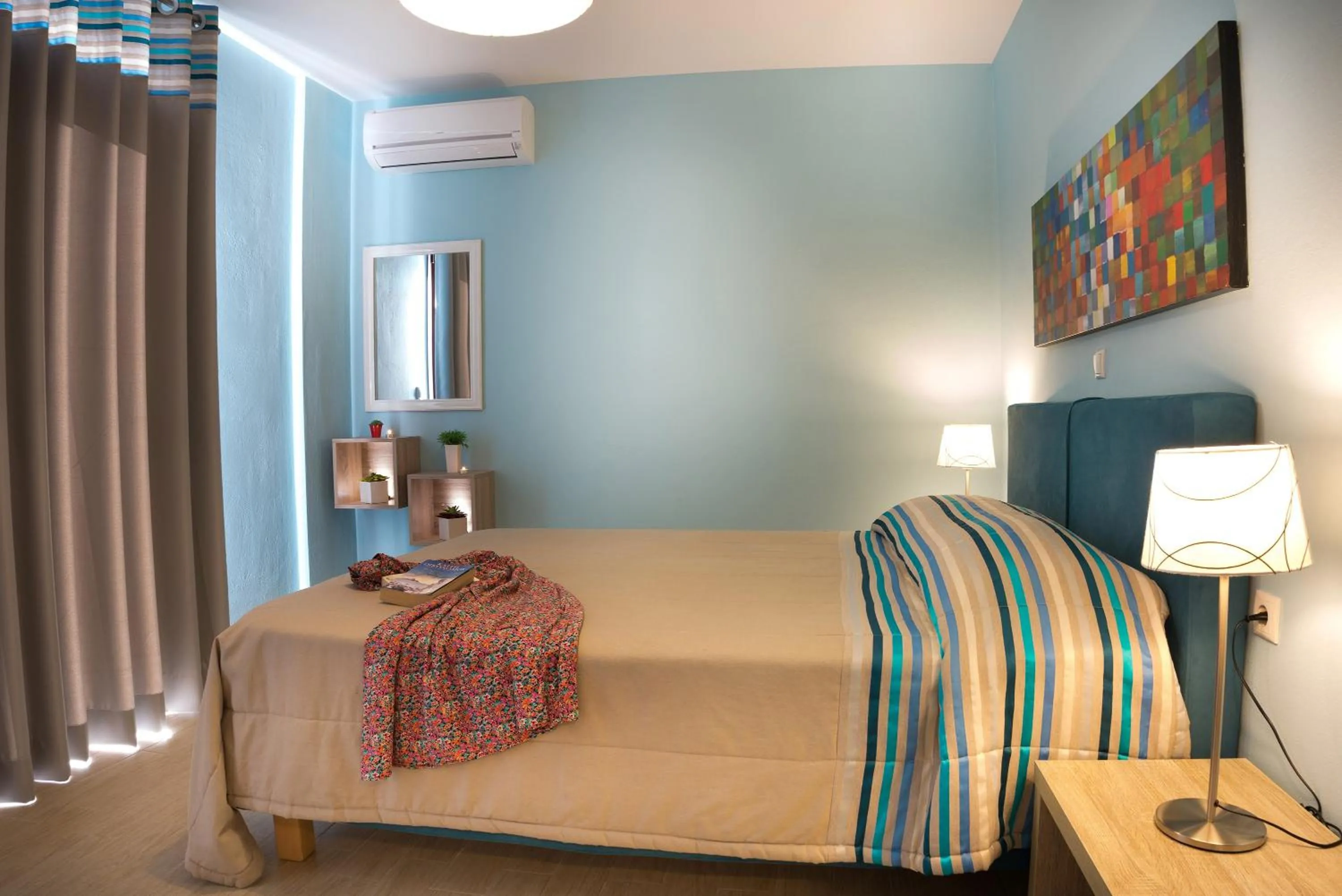 Bed in Stella in the Village Suites