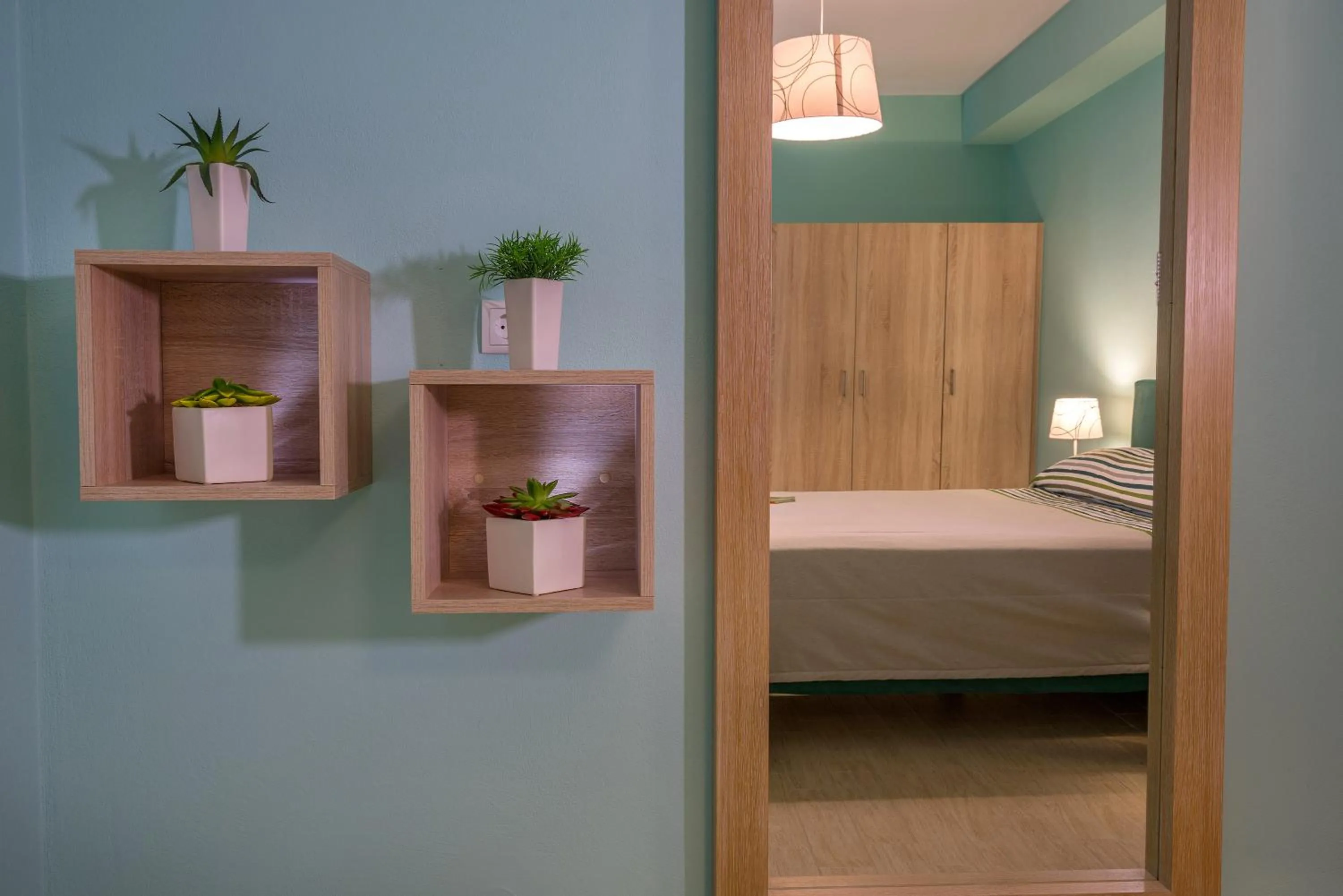 Decorative detail, Bed in Stella in the Village Suites