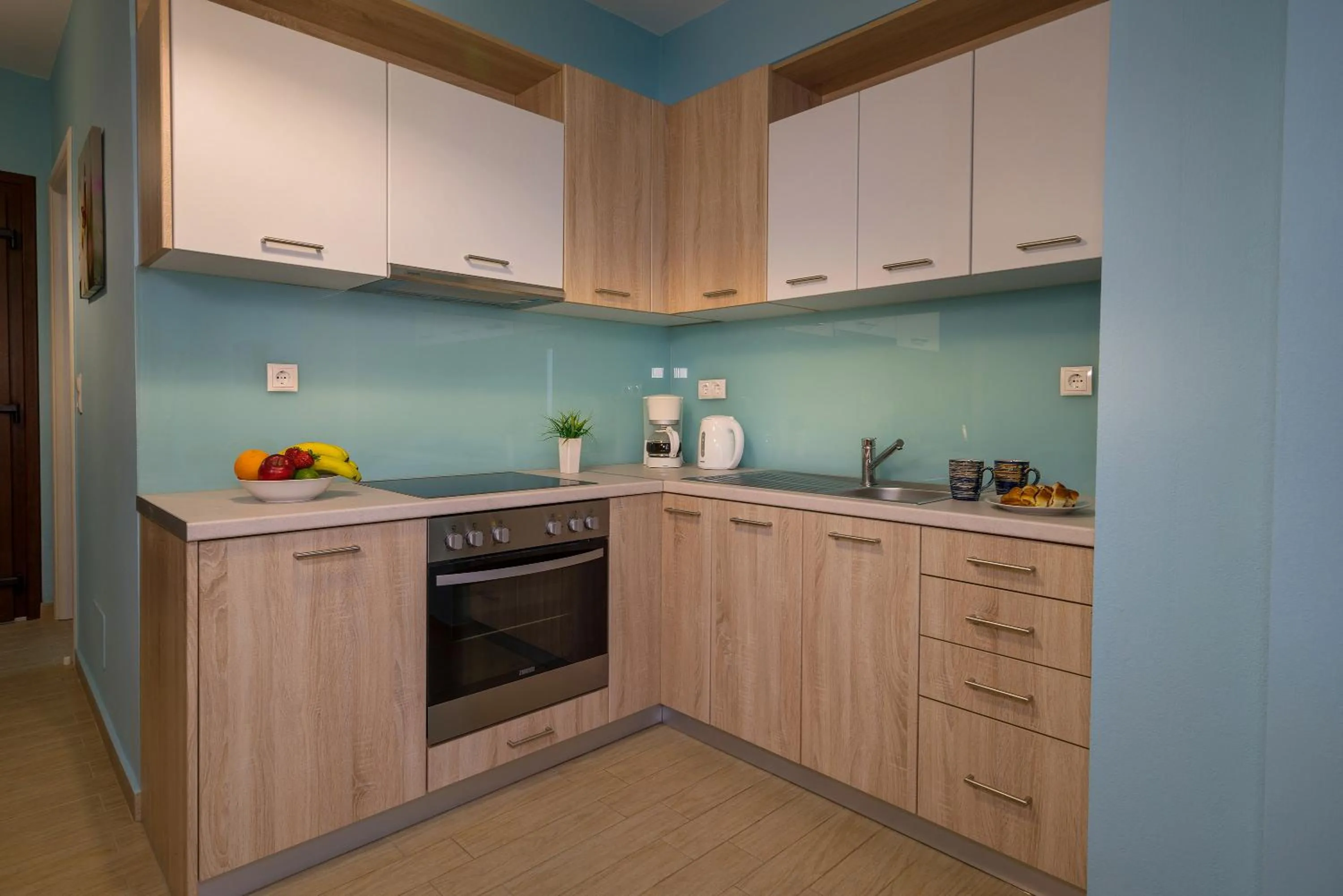 Kitchen or kitchenette in Stella in the Village Suites