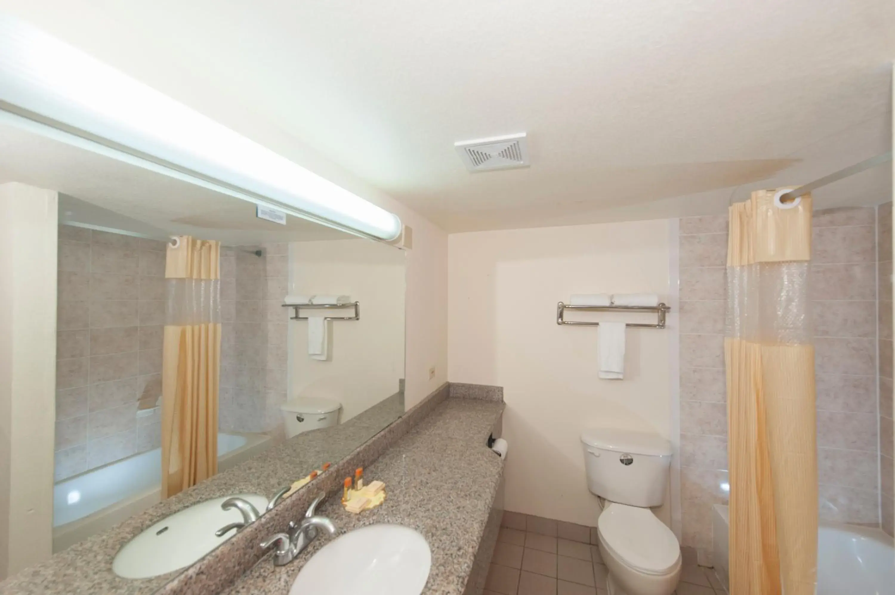 Bathroom in Days Inn & Suites by Wyndham Laredo Bathroom in Days Inn & Suites by Wyndham Laredo