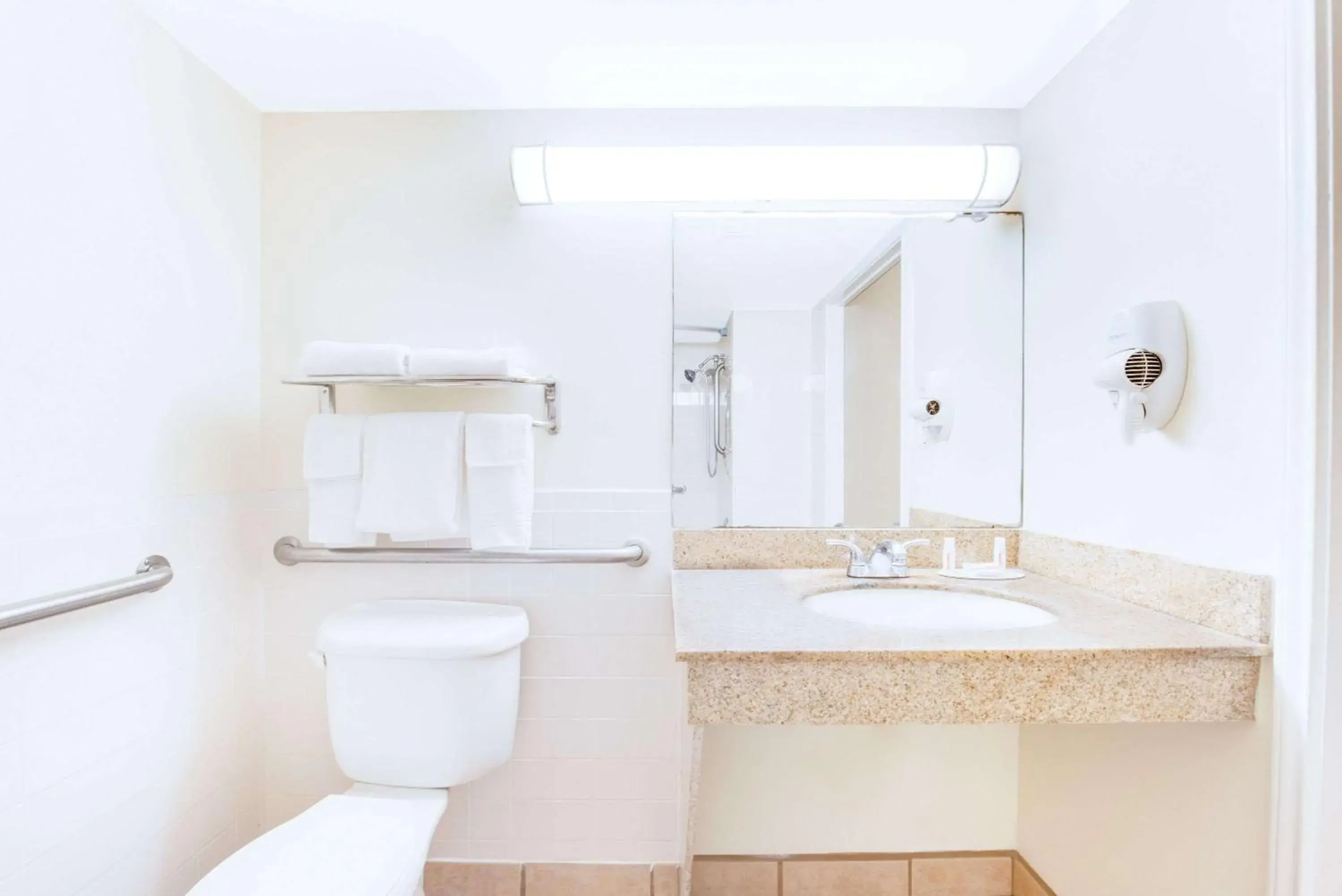 Suite with Two Double Beds and Roll-In Shower - Mobility/Hearing Accessible - Non-Smoking in Days Inn & Suites by Wyndham Laredo Suite with Two Double Beds and Roll-In Shower - Mobility/Hearing Accessible - Non-Smoking in Days Inn & Suites by Wyndham Laredo