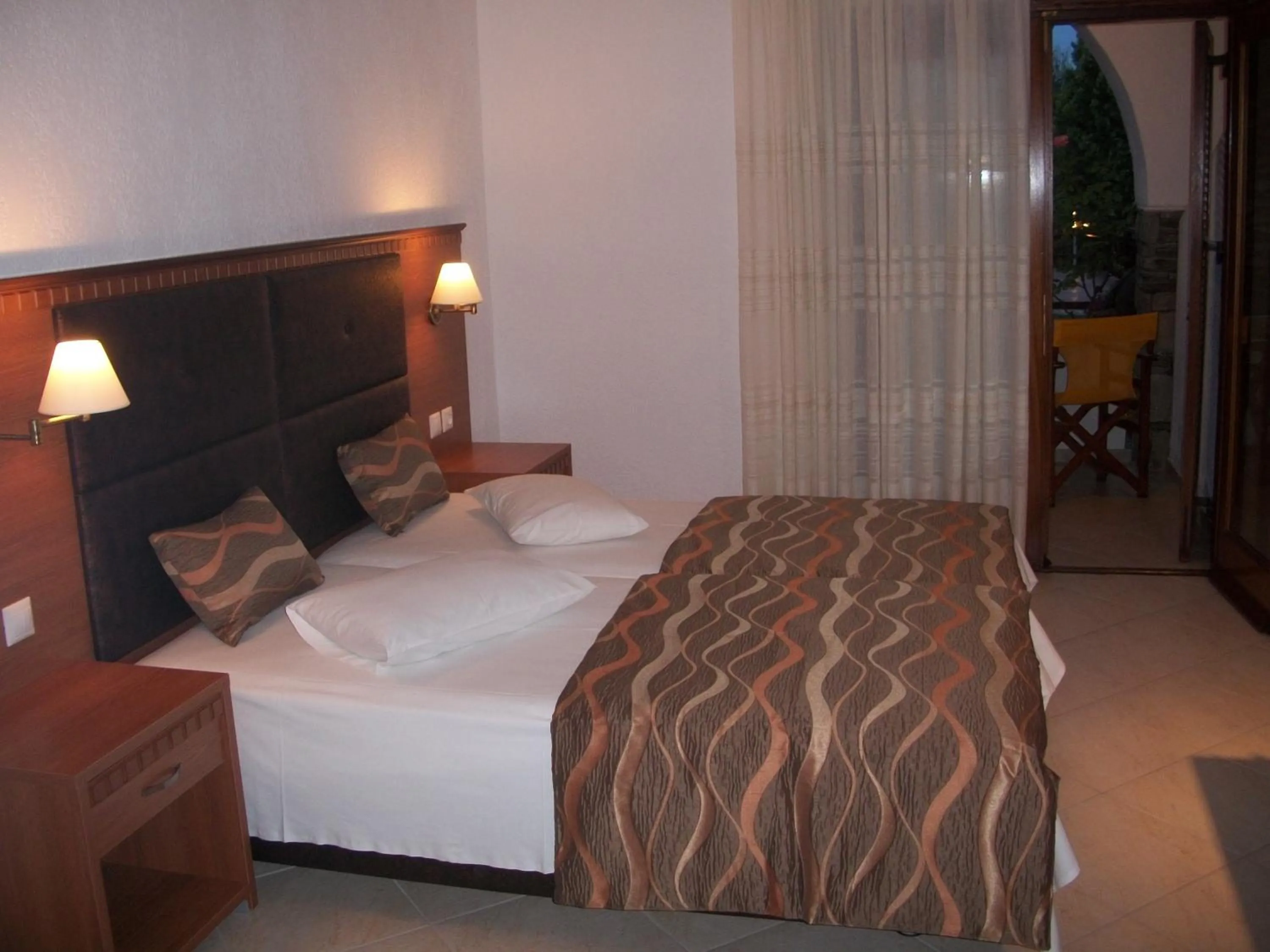 Bed in Hotel Filoxenia