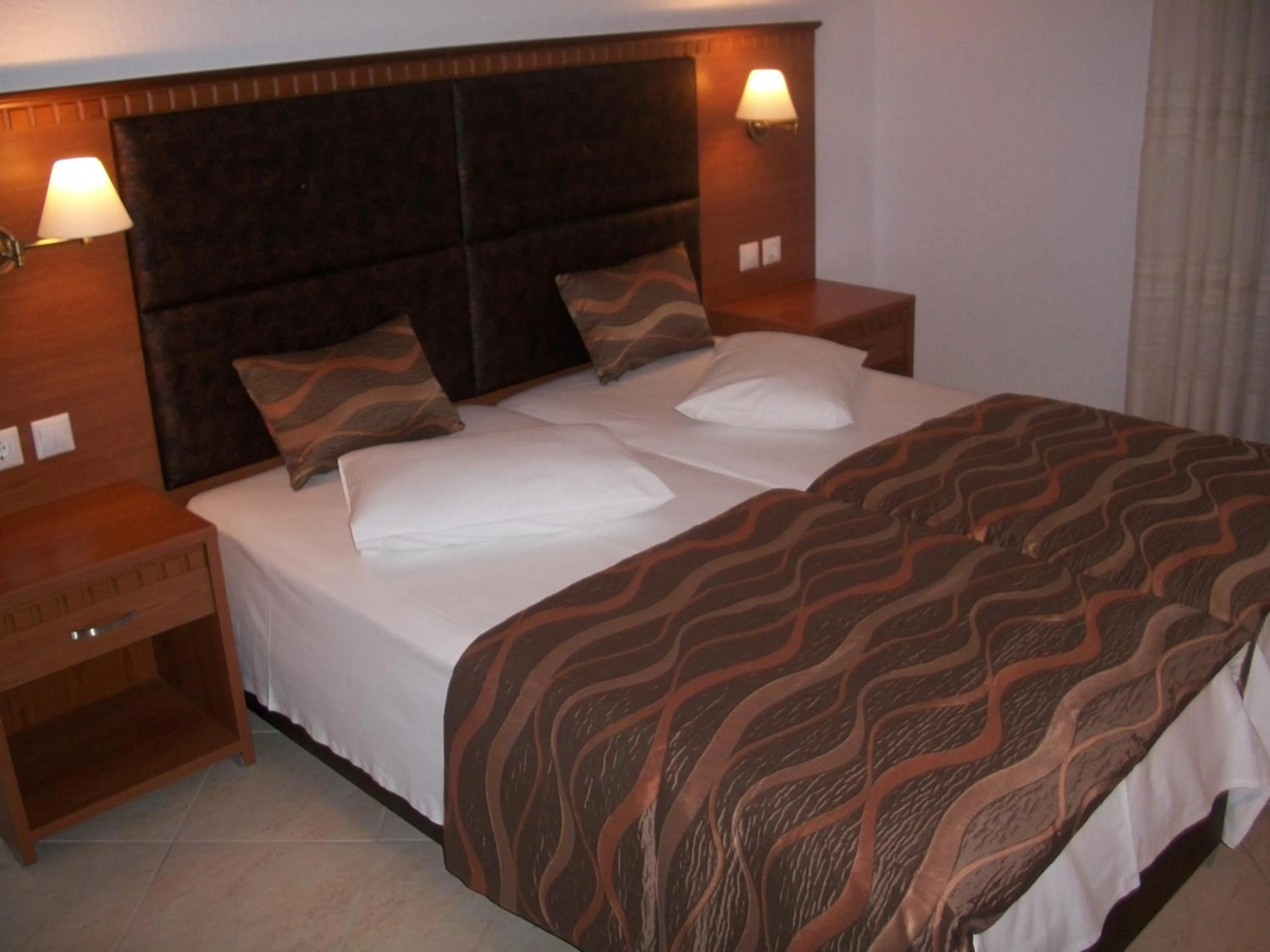 Bed in Hotel Filoxenia