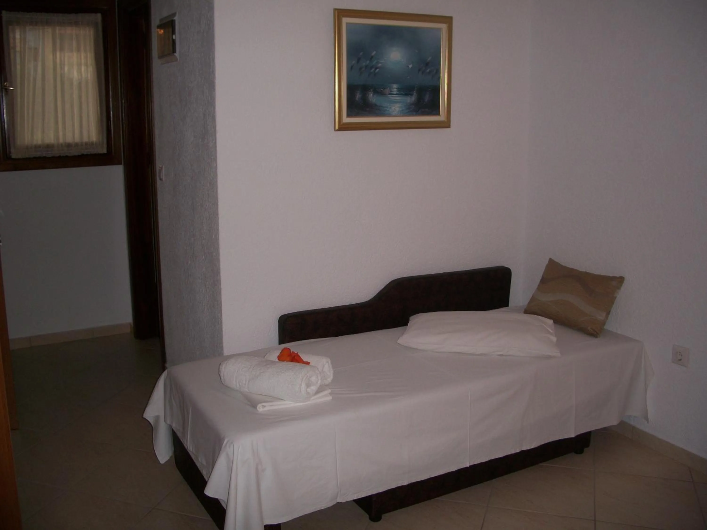 Bed in Hotel Filoxenia