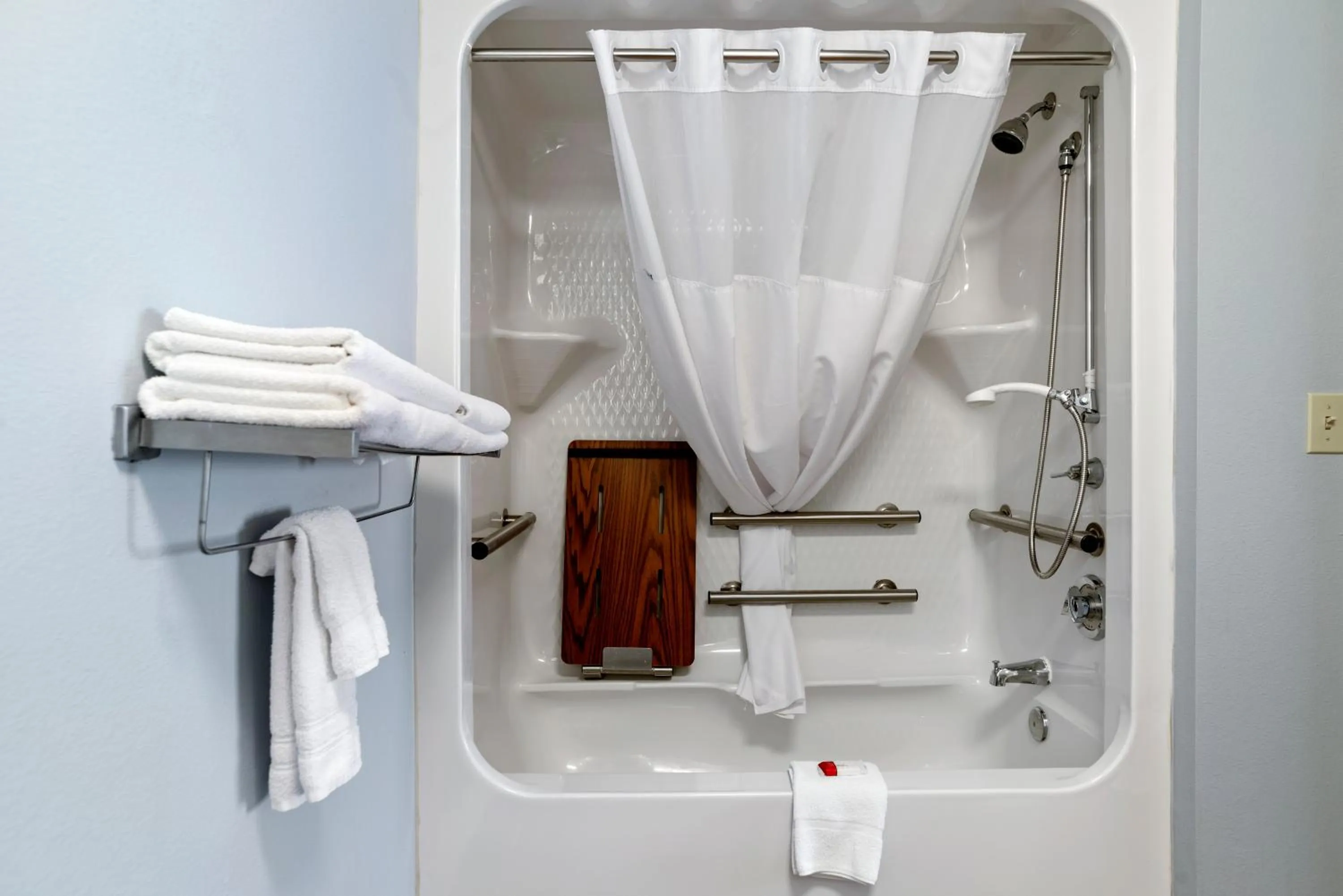 Shower in Elevation Inn & Suites, Trademark Collection by Wyndham