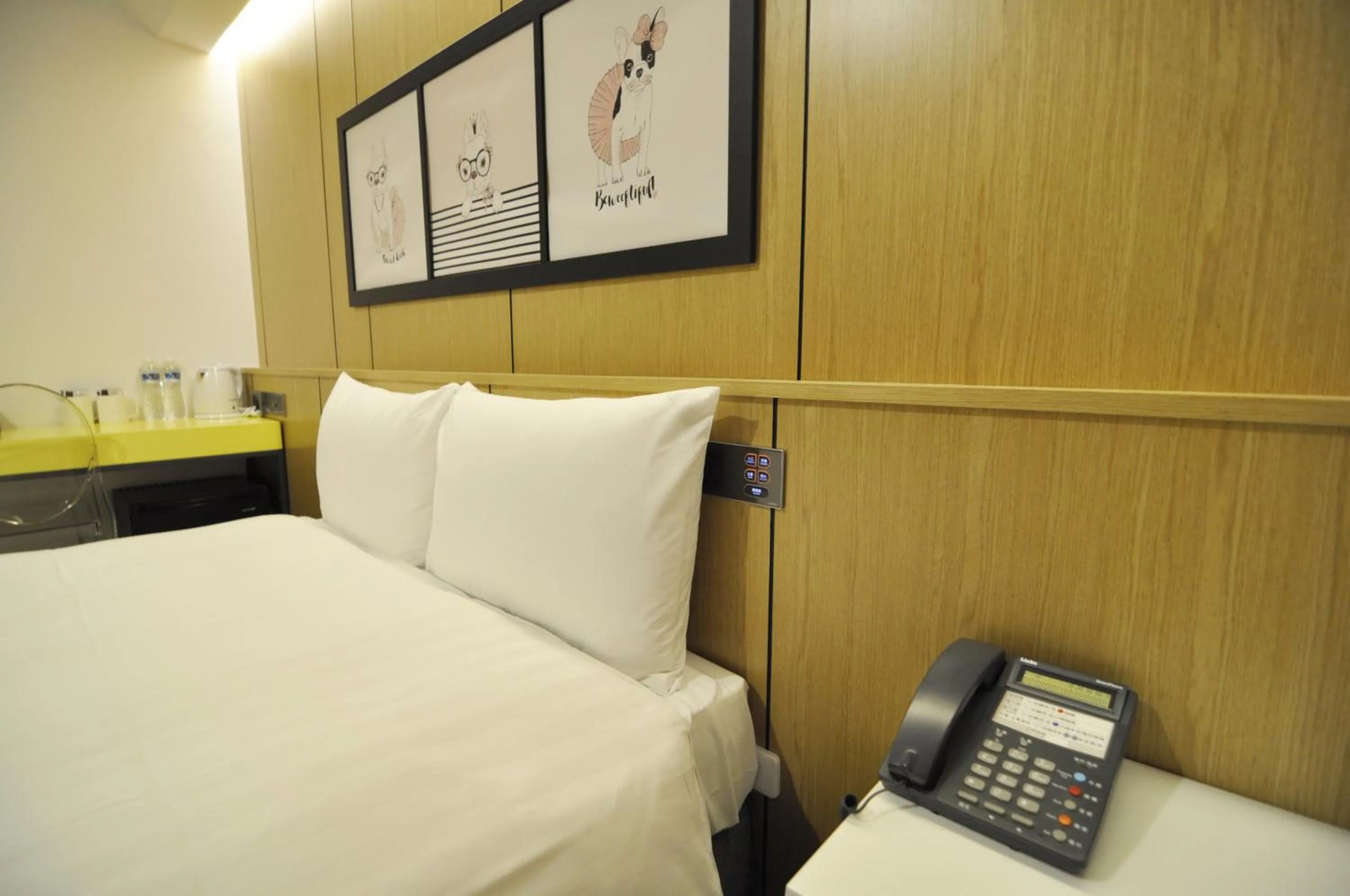 Bed in 逢甲25行館Fengjia 25 Hotel