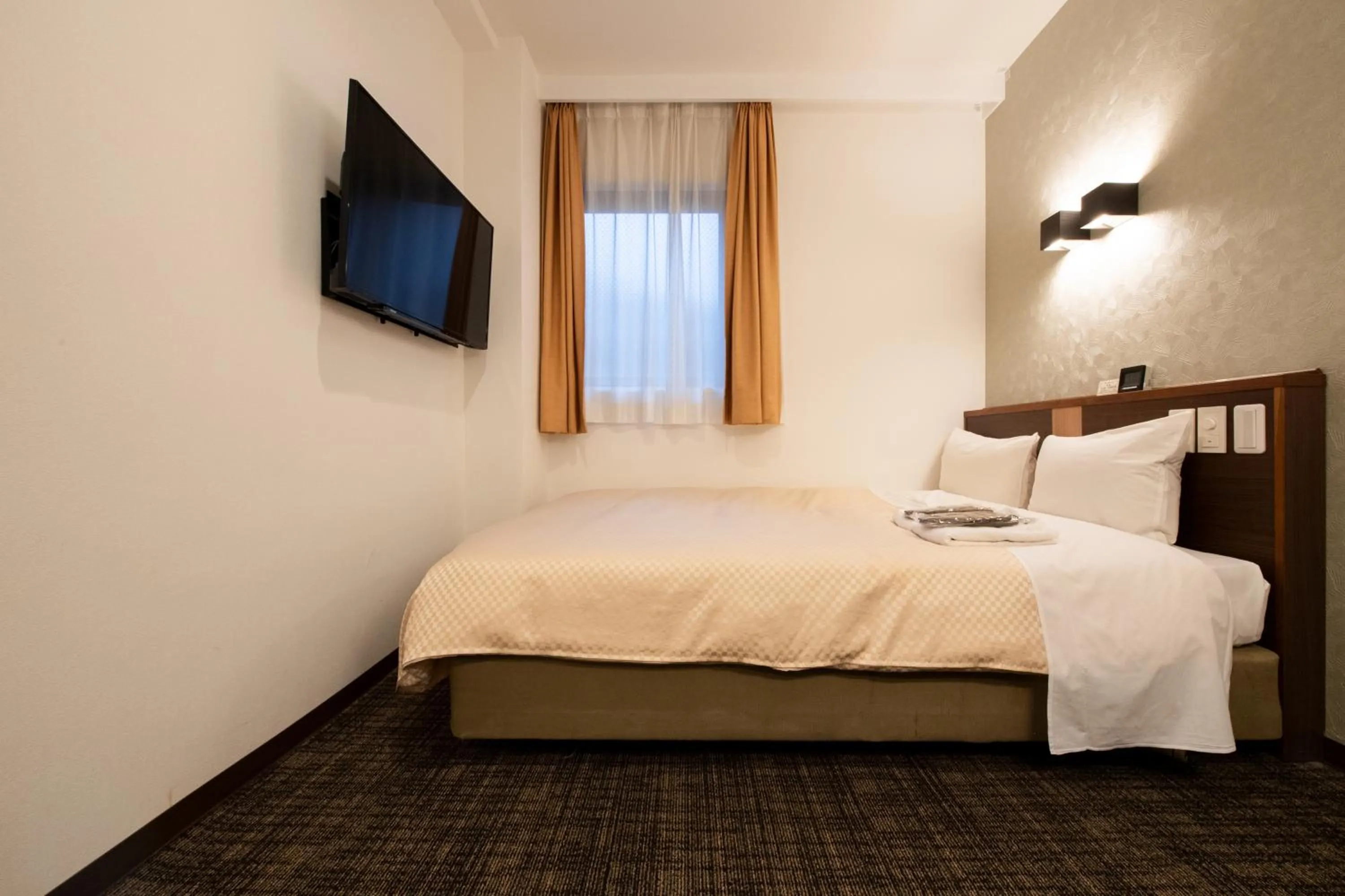 Bed in Ueno First City Hotel