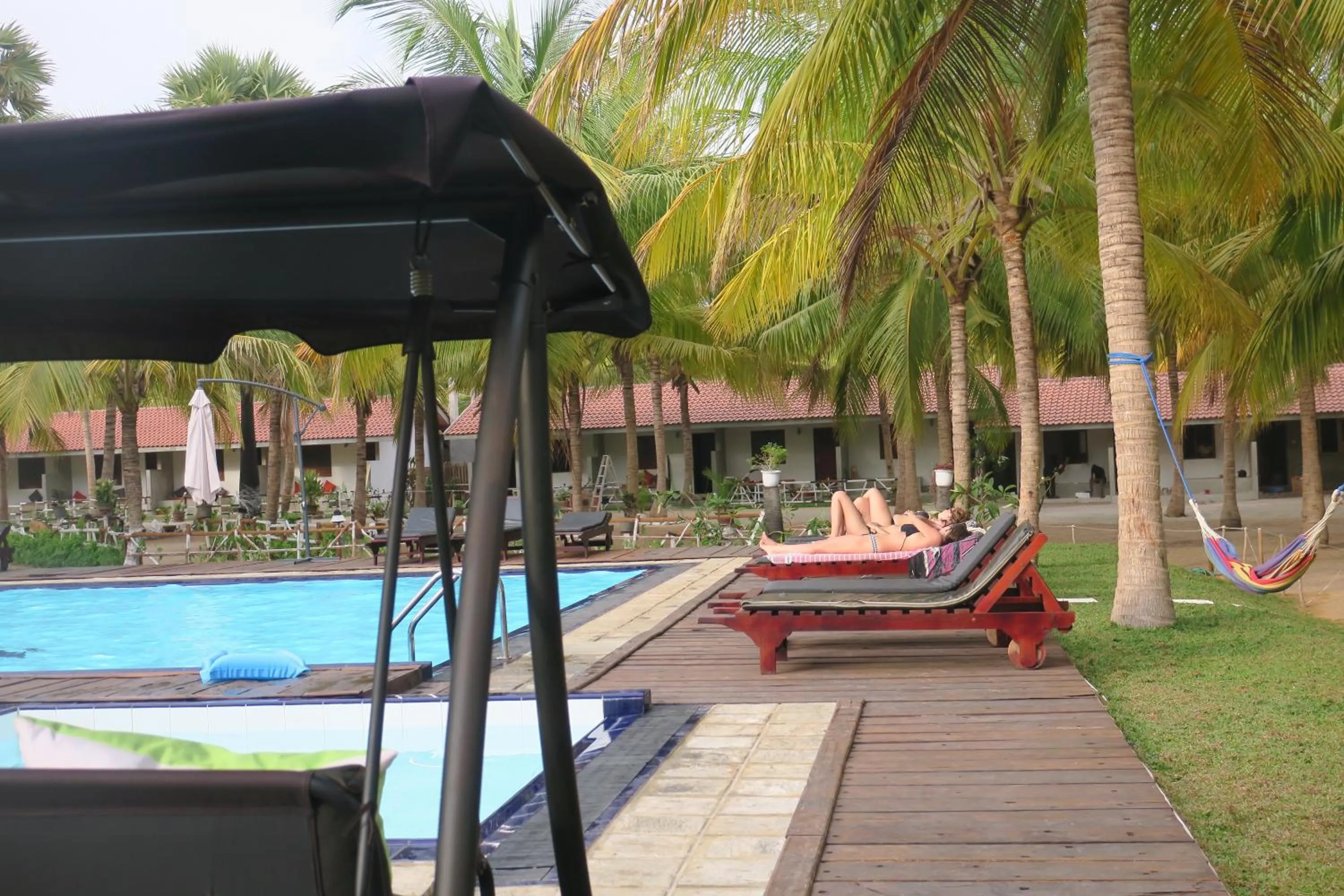 Swimming pool in De Silva Palm Resort
