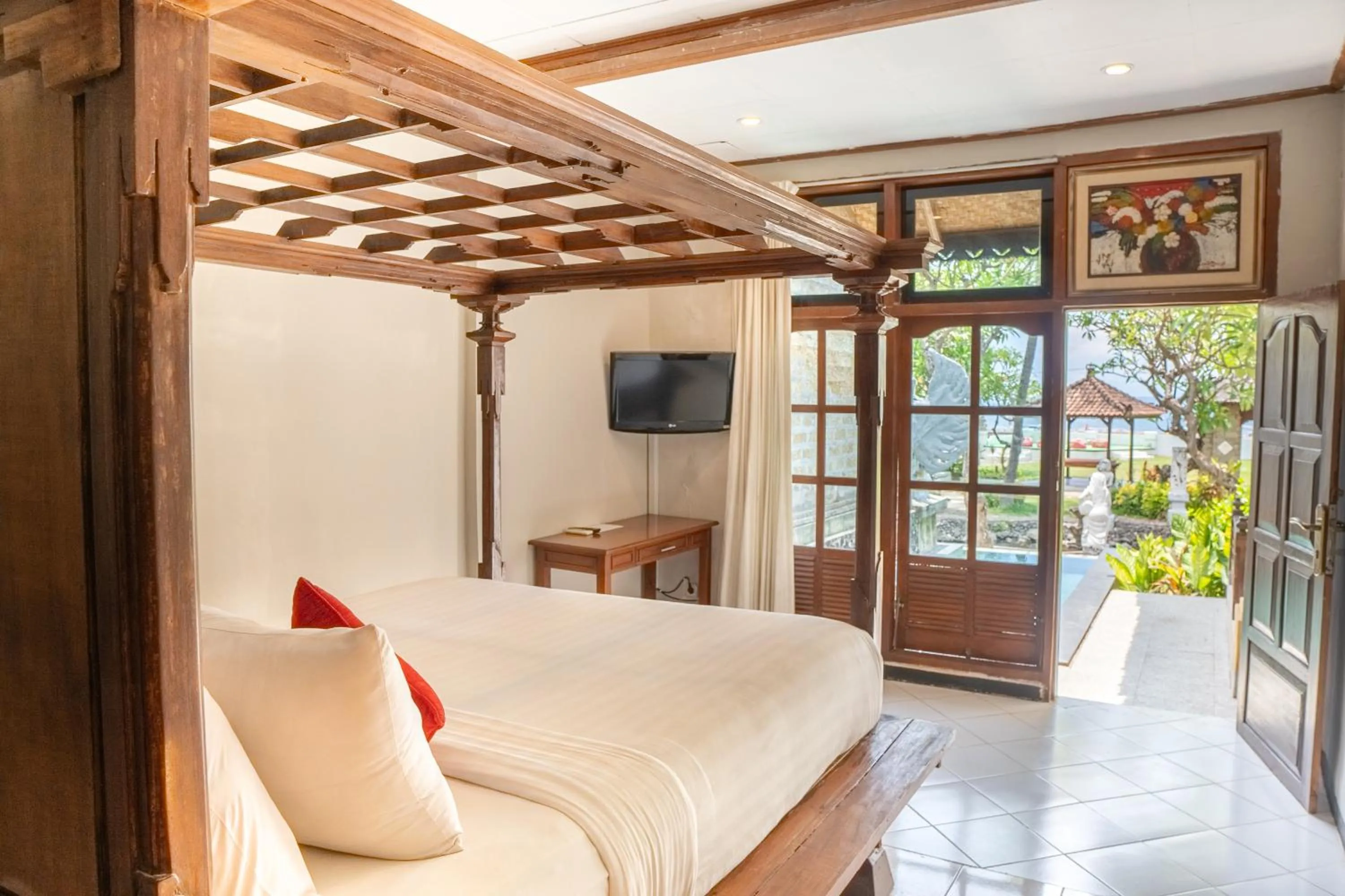 Bed in Bali Taman Beach Resort & Spa Lovina