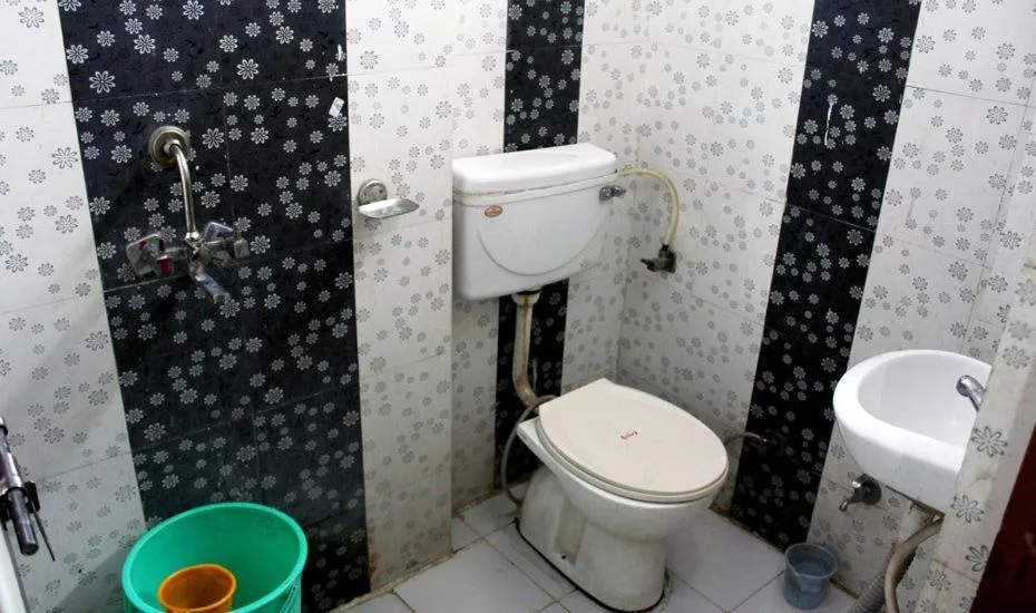 Toilet in Hotel New City Inn