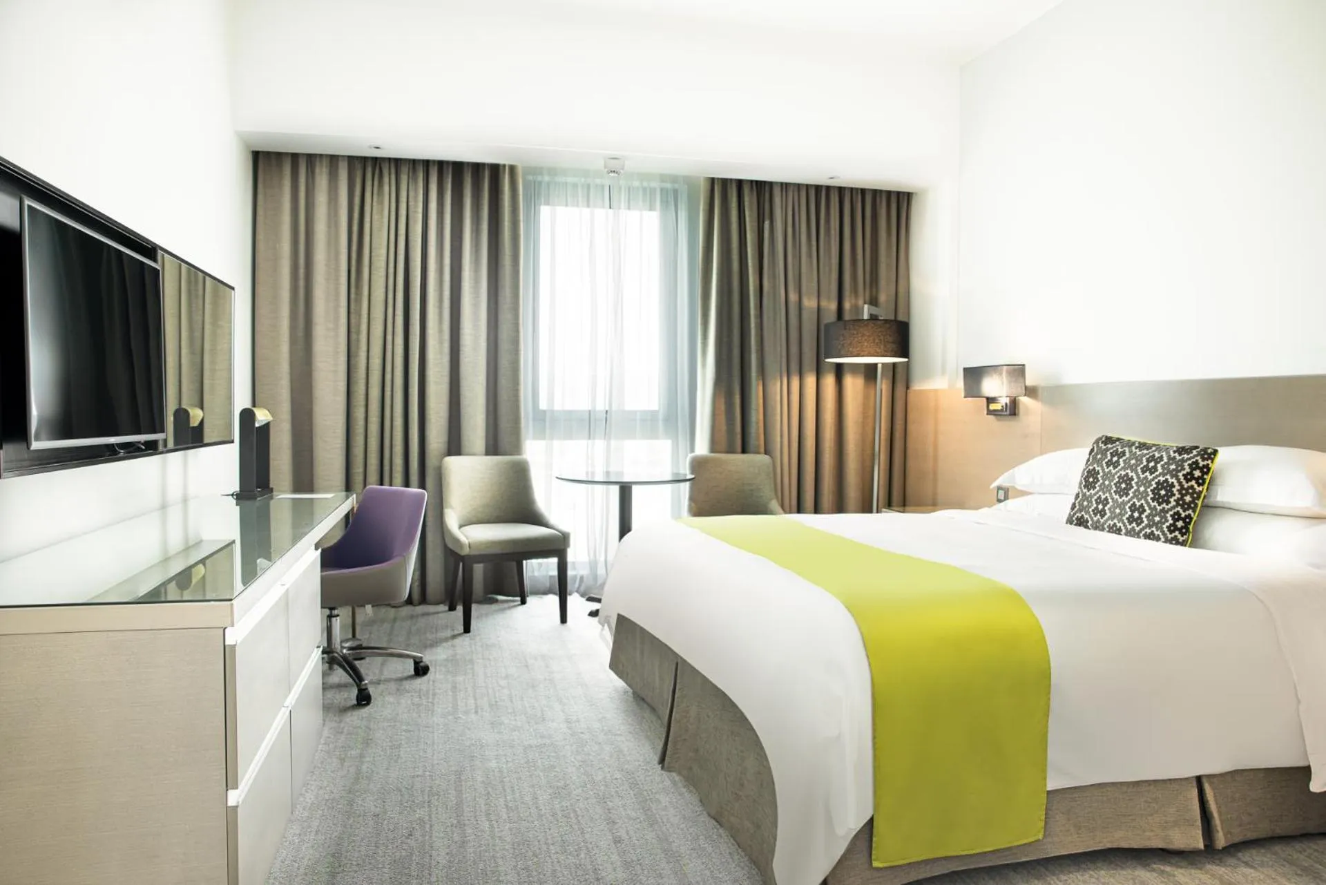 Bed in Novotel Muscat Airport