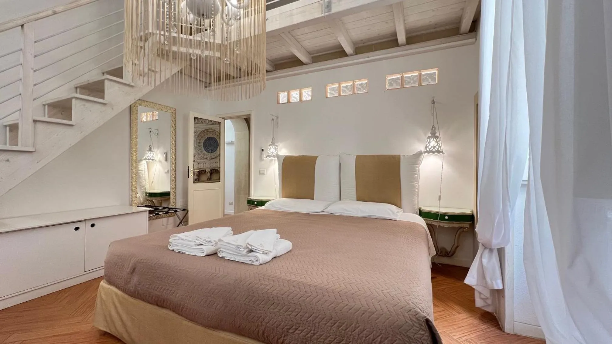 Bed in Cadelli Luxury Suite & Apartments